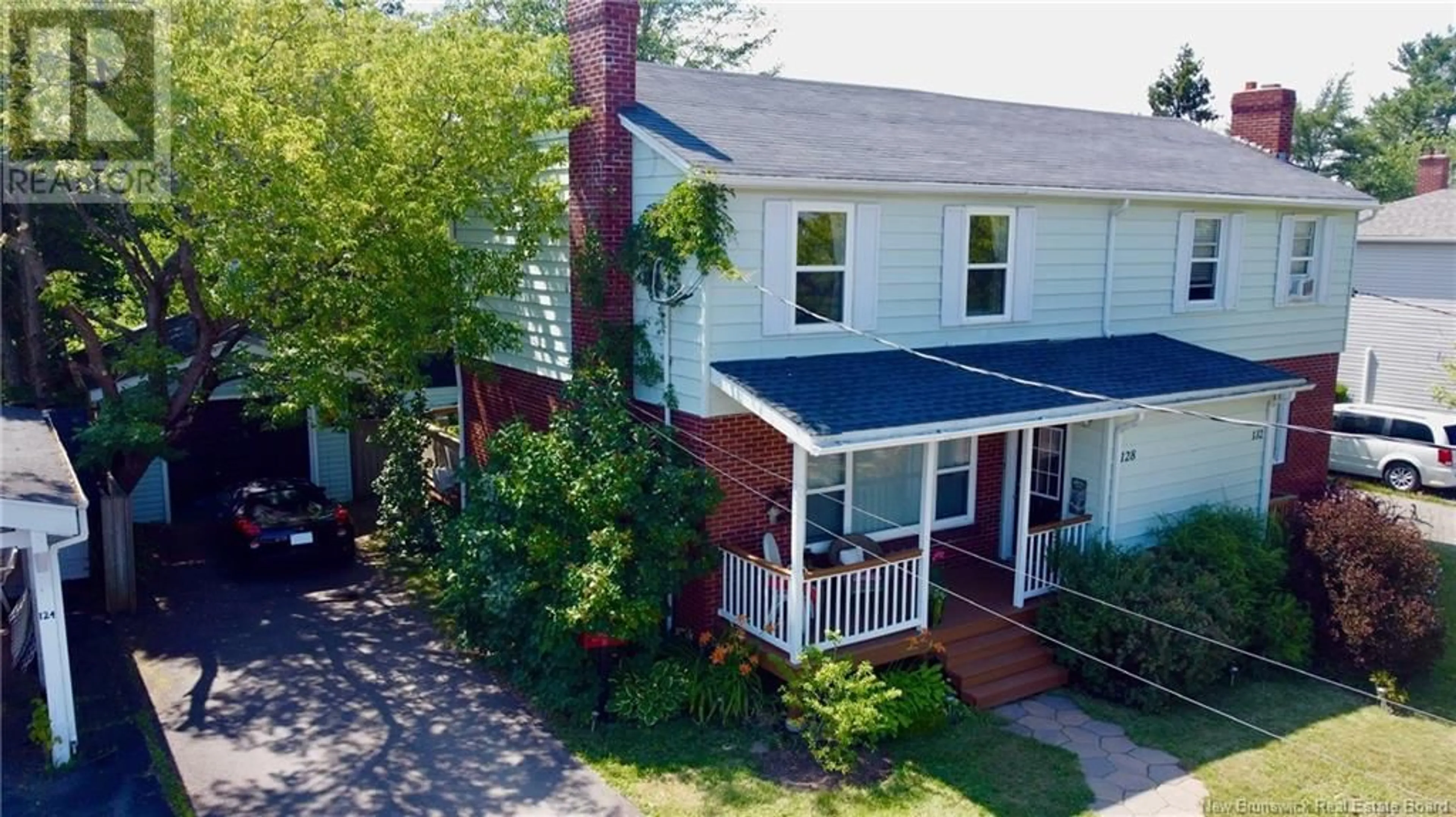 A pic from outside/outdoor area/front of a property/back of a property/a pic from drone, street for 128 EDGETT AVENUE, Moncton New Brunswick E1C7B3