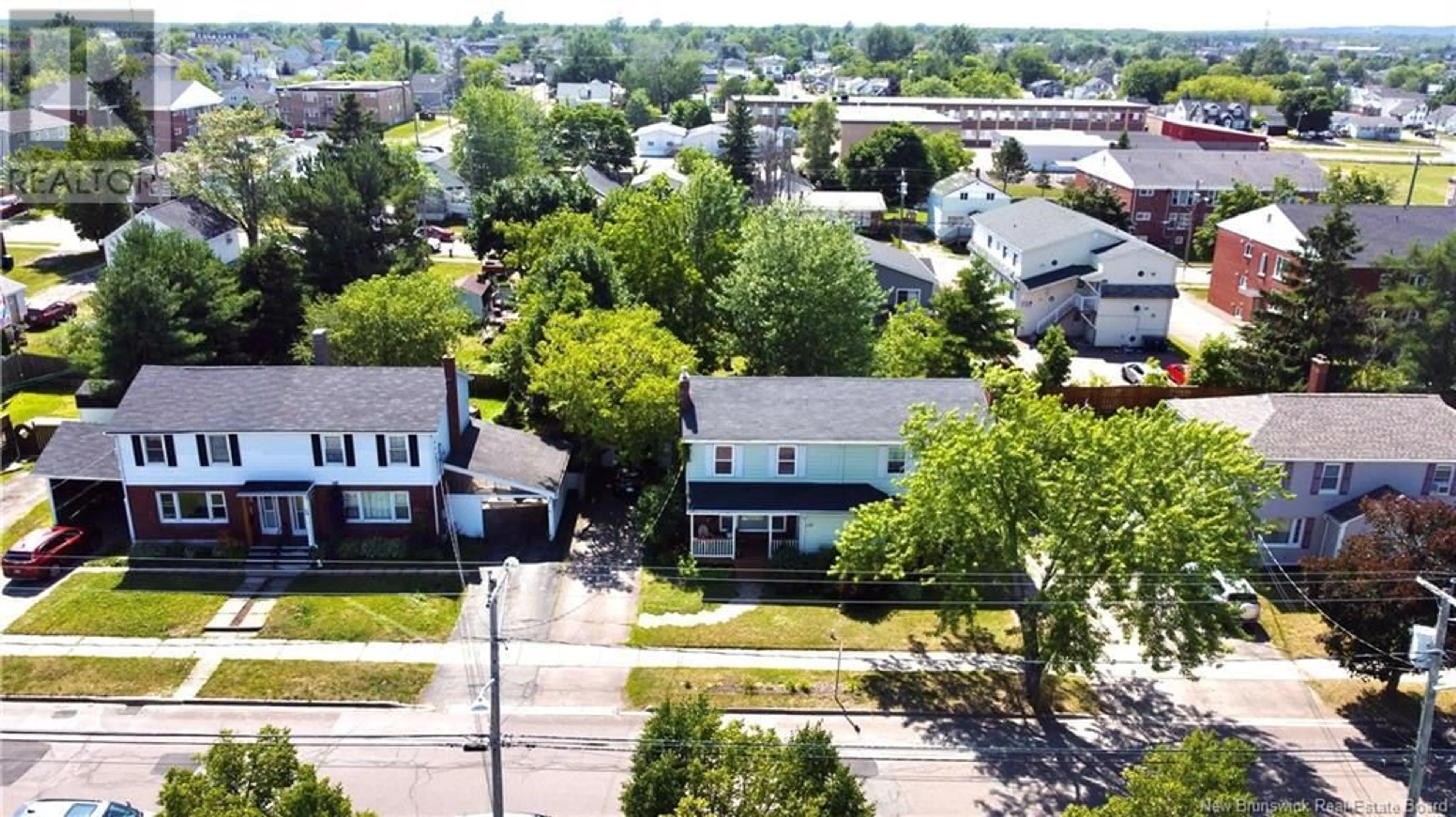 A pic from outside/outdoor area/front of a property/back of a property/a pic from drone, street for 128 EDGETT AVENUE, Moncton New Brunswick E1C7B3