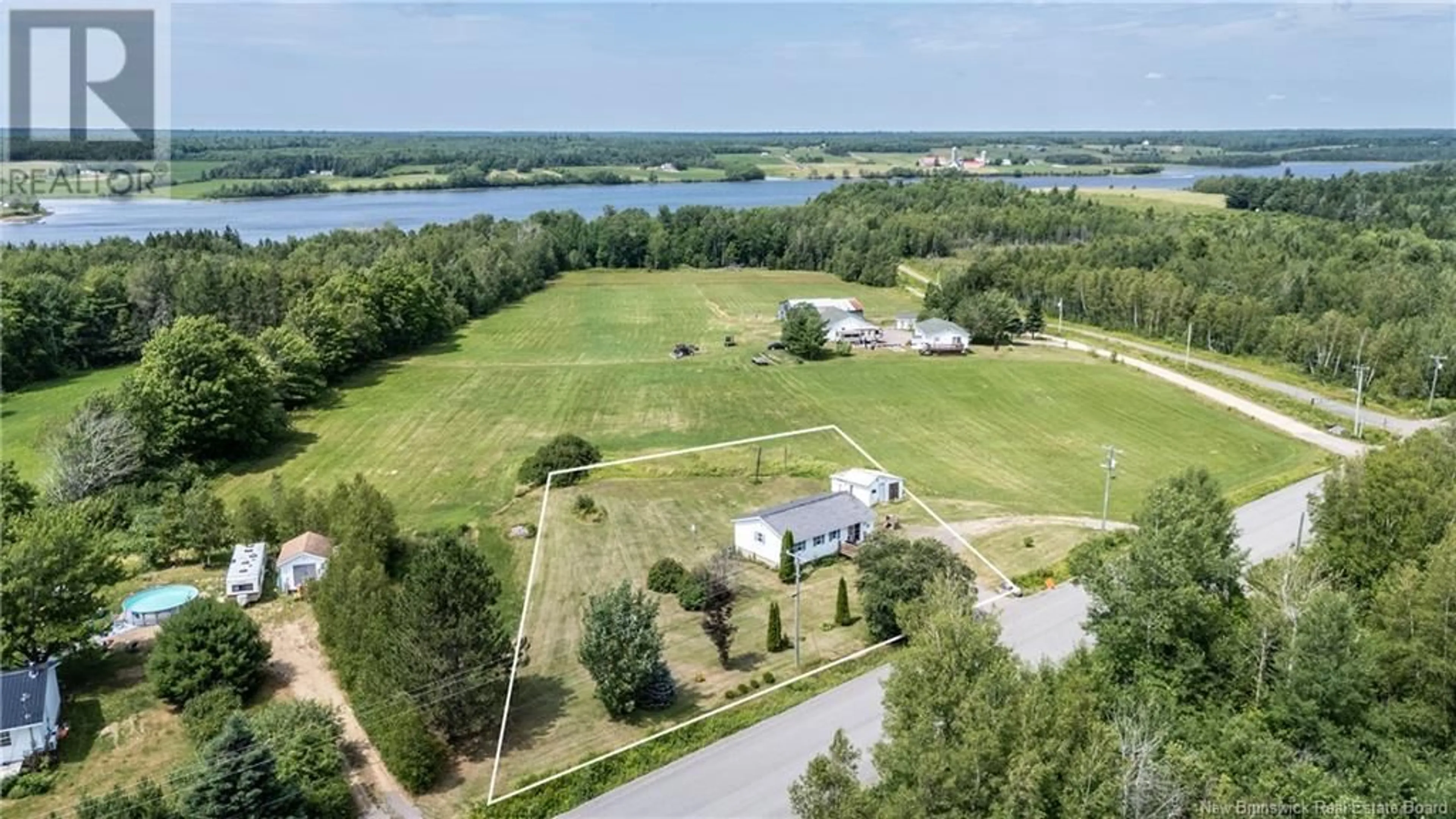 A pic from outside/outdoor area/front of a property/back of a property/a pic from drone, water/lake/river/ocean view for 2294 ROUTE 510, Targettville New Brunswick E4T1V6