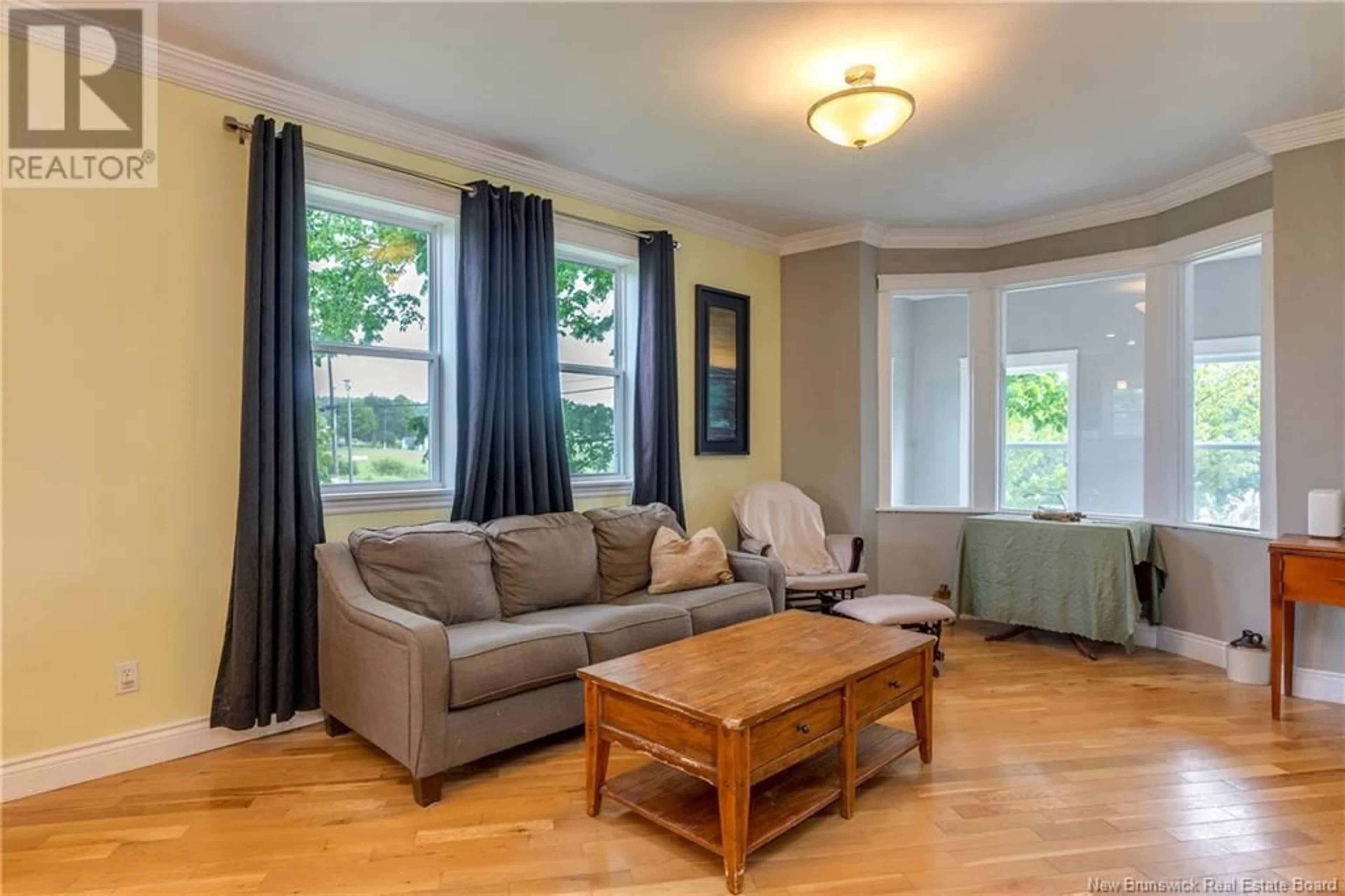 Living room with furniture, wood/laminate floor for 889 LATIMORE LAKE, Saint John New Brunswick E2N1X9