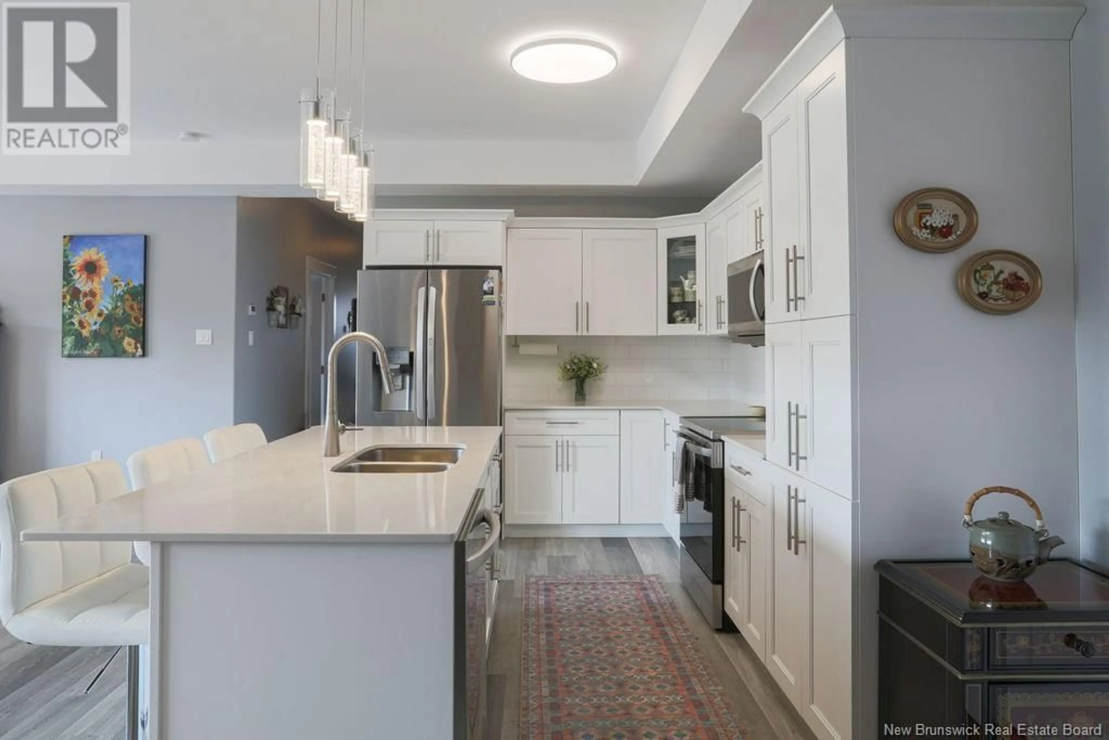 Open concept kitchen, ceramic/tile floor for 206 - 79 MAPLEVIEW, Hampton New Brunswick E5N0A6