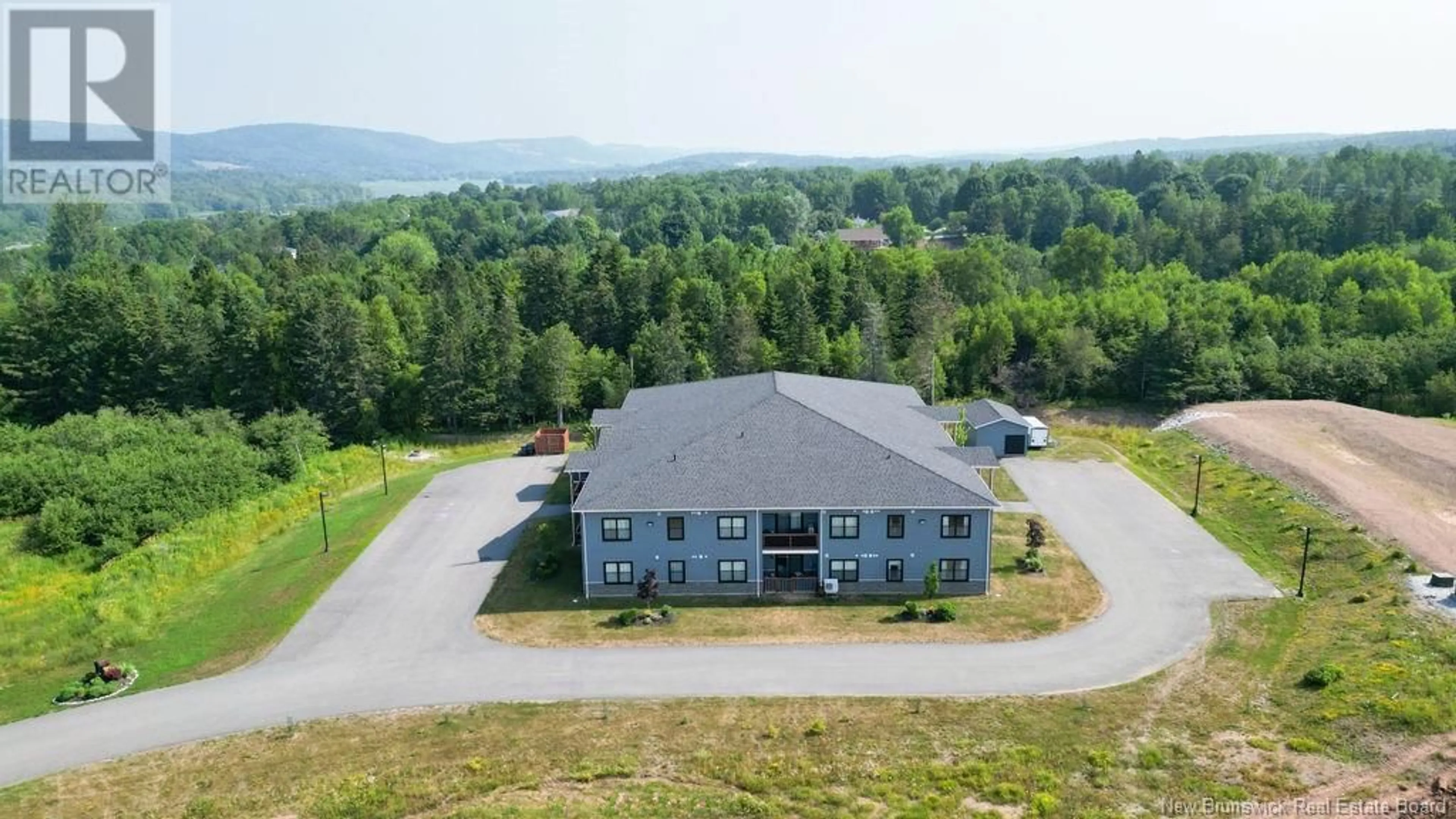 A pic from outside/outdoor area/front of a property/back of a property/a pic from drone, unknown for 206 - 79 MAPLEVIEW, Hampton New Brunswick E5N0A6