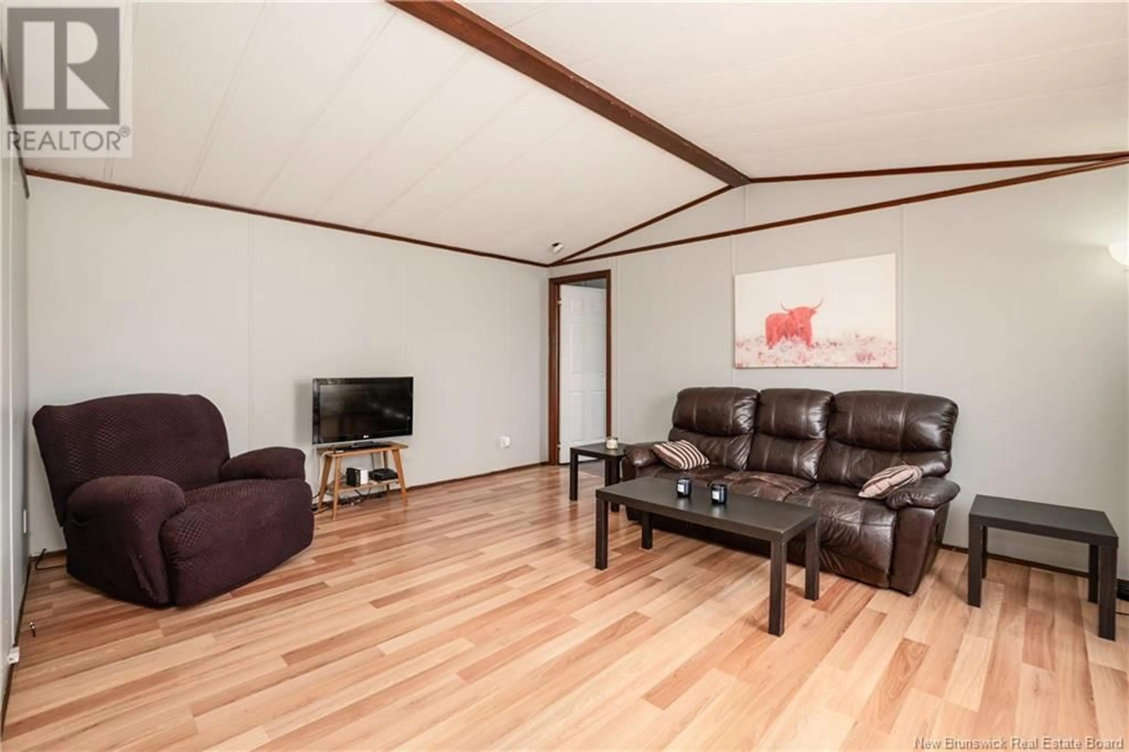 Living room with furniture, wood/laminate floor for 3 DAFFODIL LANE, Riverview New Brunswick E1B4Z2