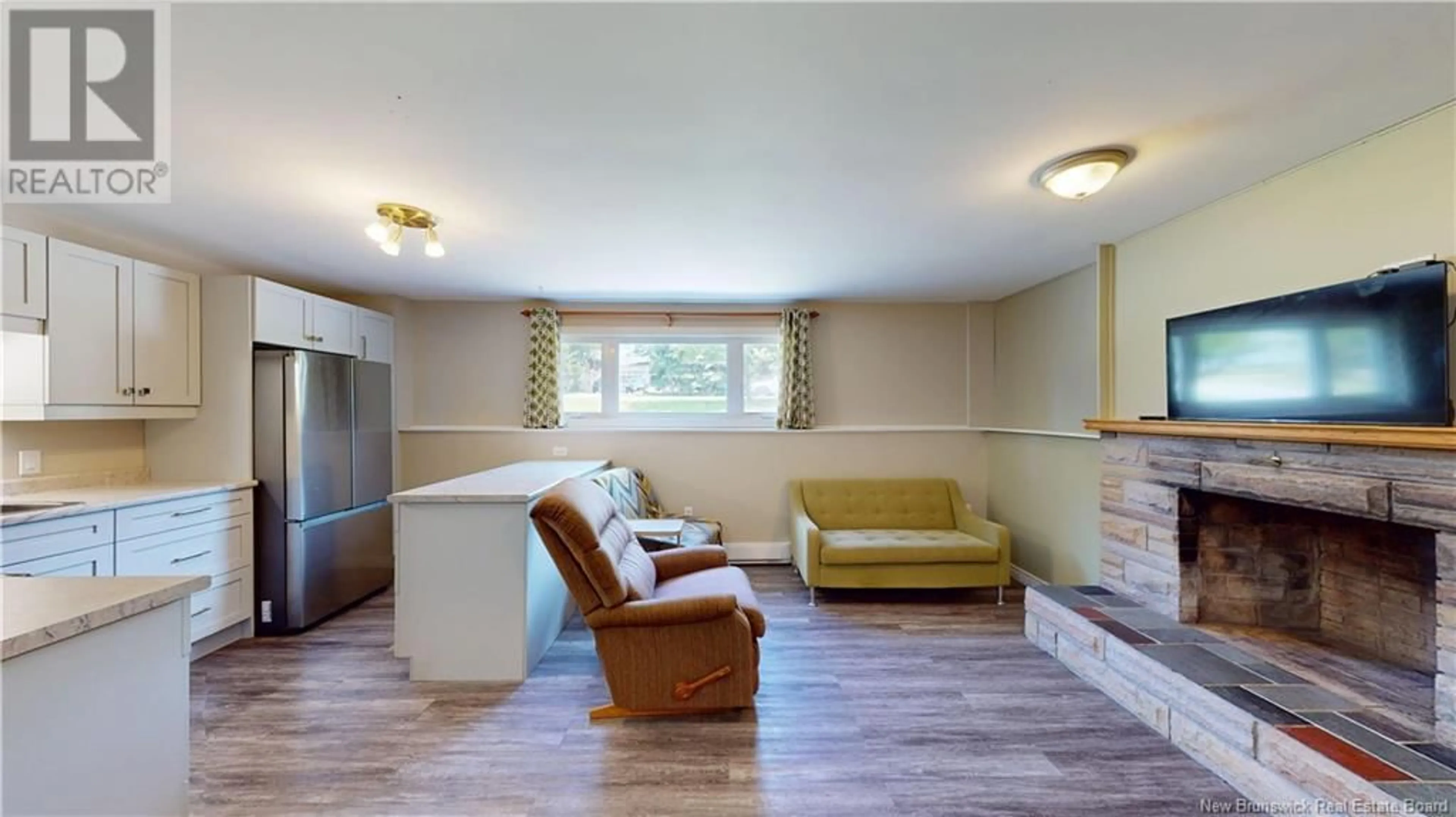 Living room with furniture, wood/laminate floor for 123 MARIANNE DRIVE, Quispamsis New Brunswick E2E1G6