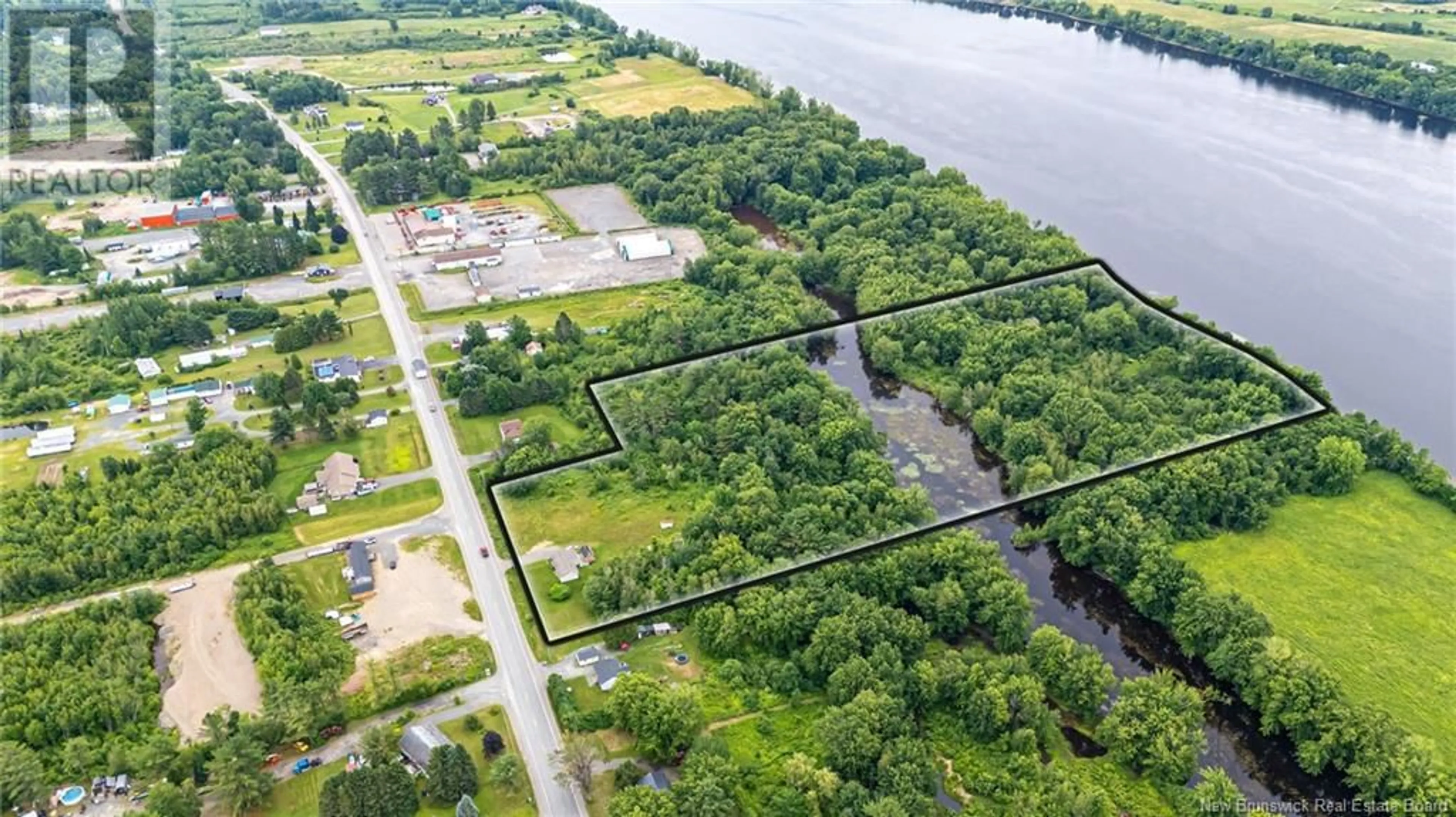 A pic from outside/outdoor area/front of a property/back of a property/a pic from drone, water/lake/river/ocean view for 240 105 ROUTE, Maugerville New Brunswick E3A8P1