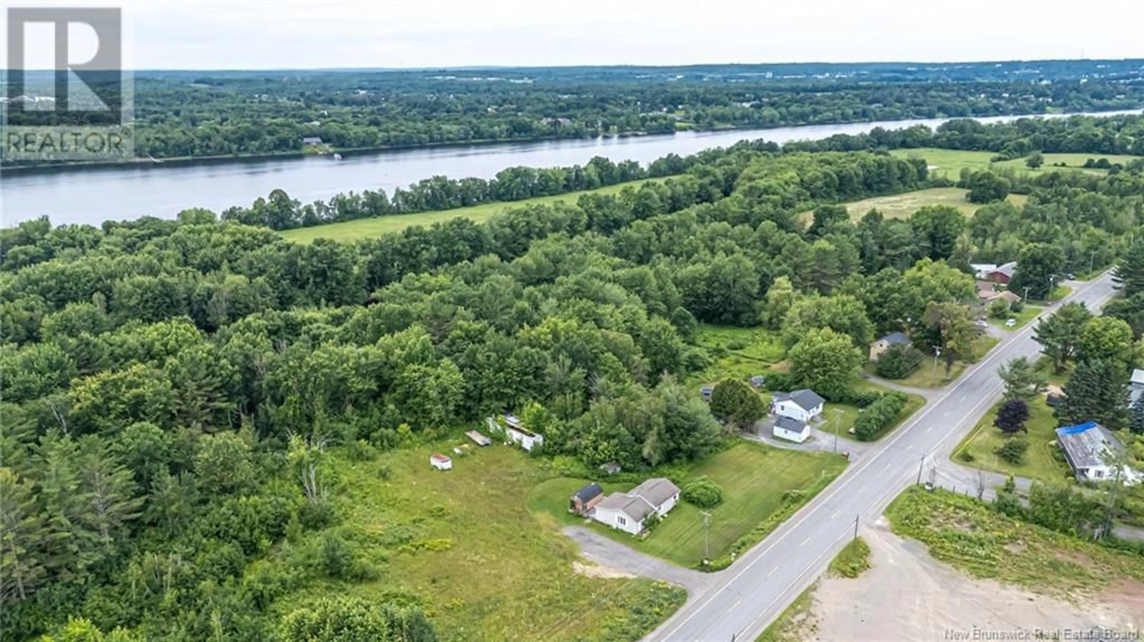 A pic from outside/outdoor area/front of a property/back of a property/a pic from drone, water/lake/river/ocean view for 240 105 ROUTE, Maugerville New Brunswick E3A8P1