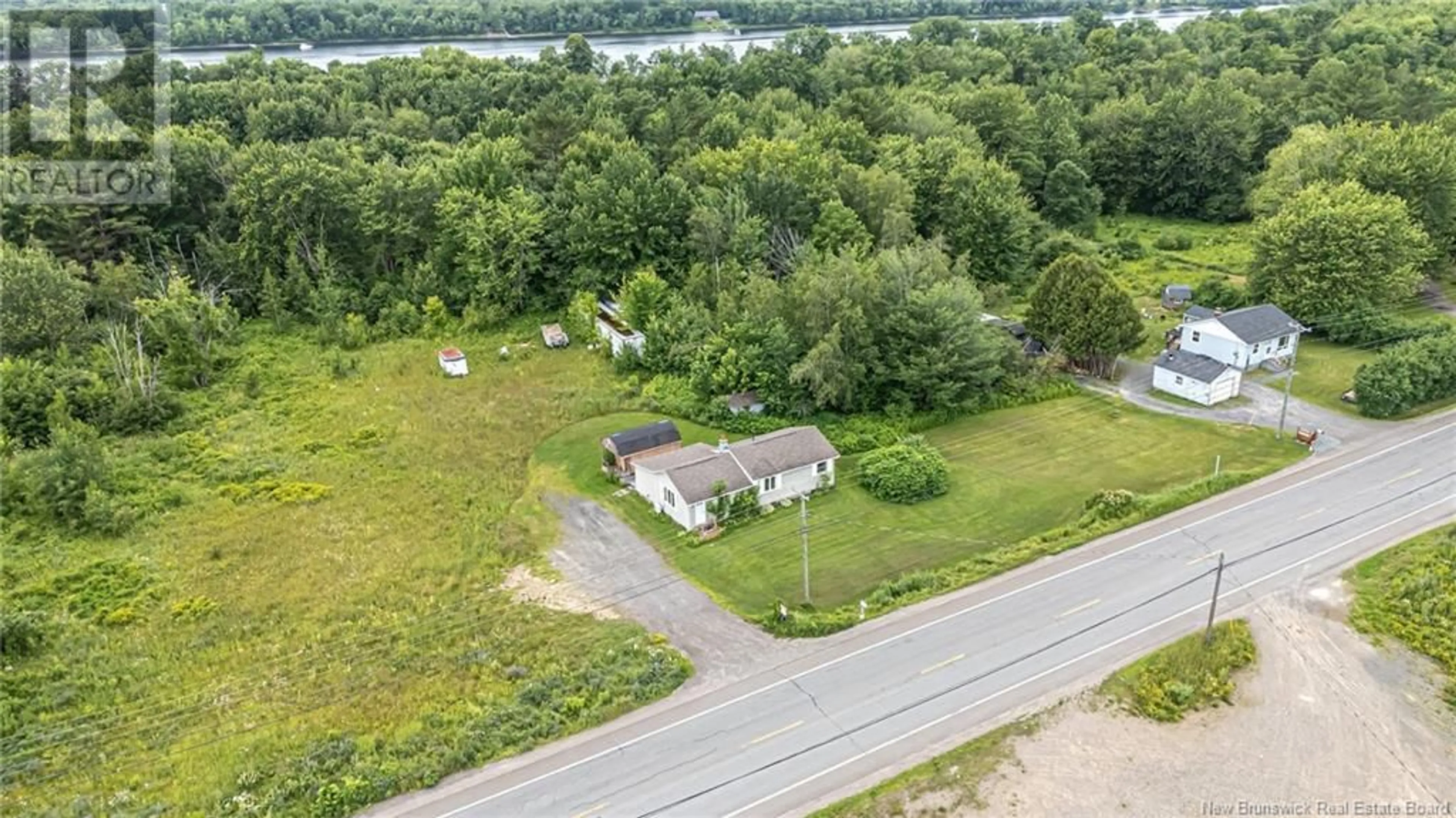 A pic from outside/outdoor area/front of a property/back of a property/a pic from drone, water/lake/river/ocean view for 240 105 ROUTE, Maugerville New Brunswick E3A8P1