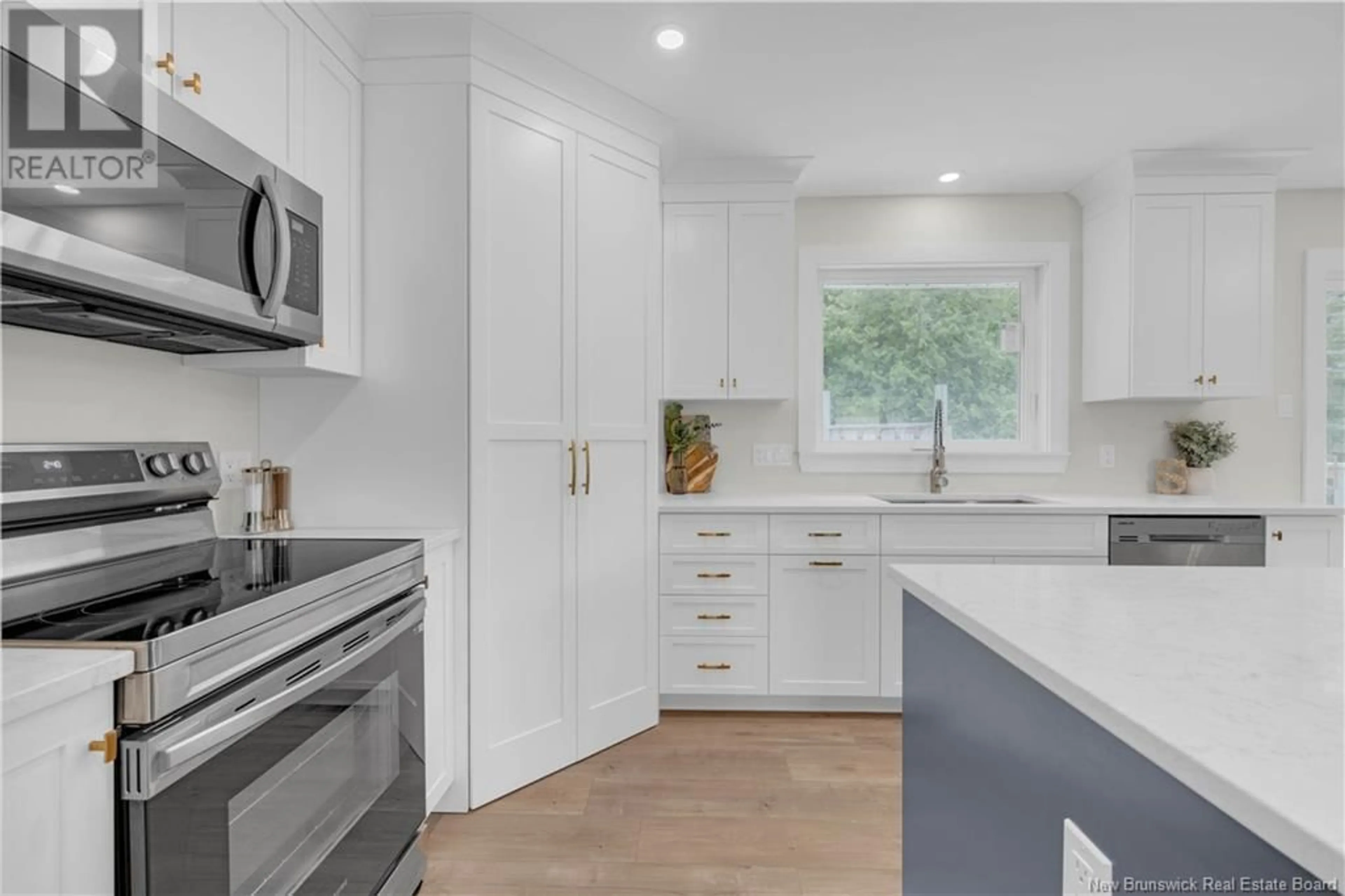 Open concept kitchen, ceramic/tile floor for 23 COUNTRY CRESCENT, Quispamsis New Brunswick E2E1T3
