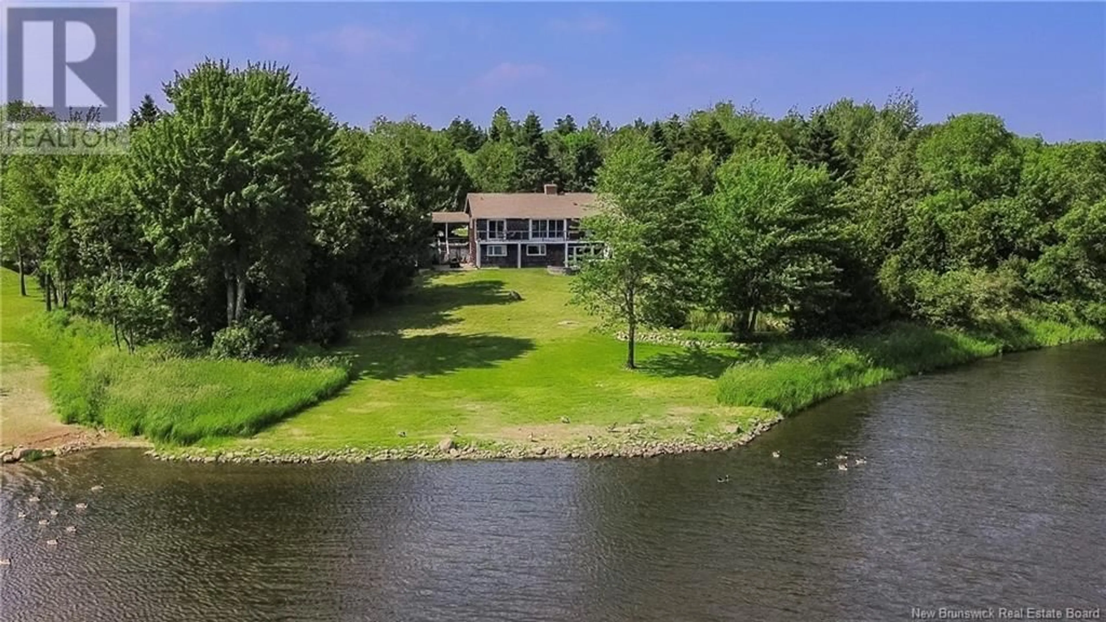 A pic from outside/outdoor area/front of a property/back of a property/a pic from drone, water/lake/river/ocean view for 37 MALISEET DRIVE, Rothesay New Brunswick E2E2G3