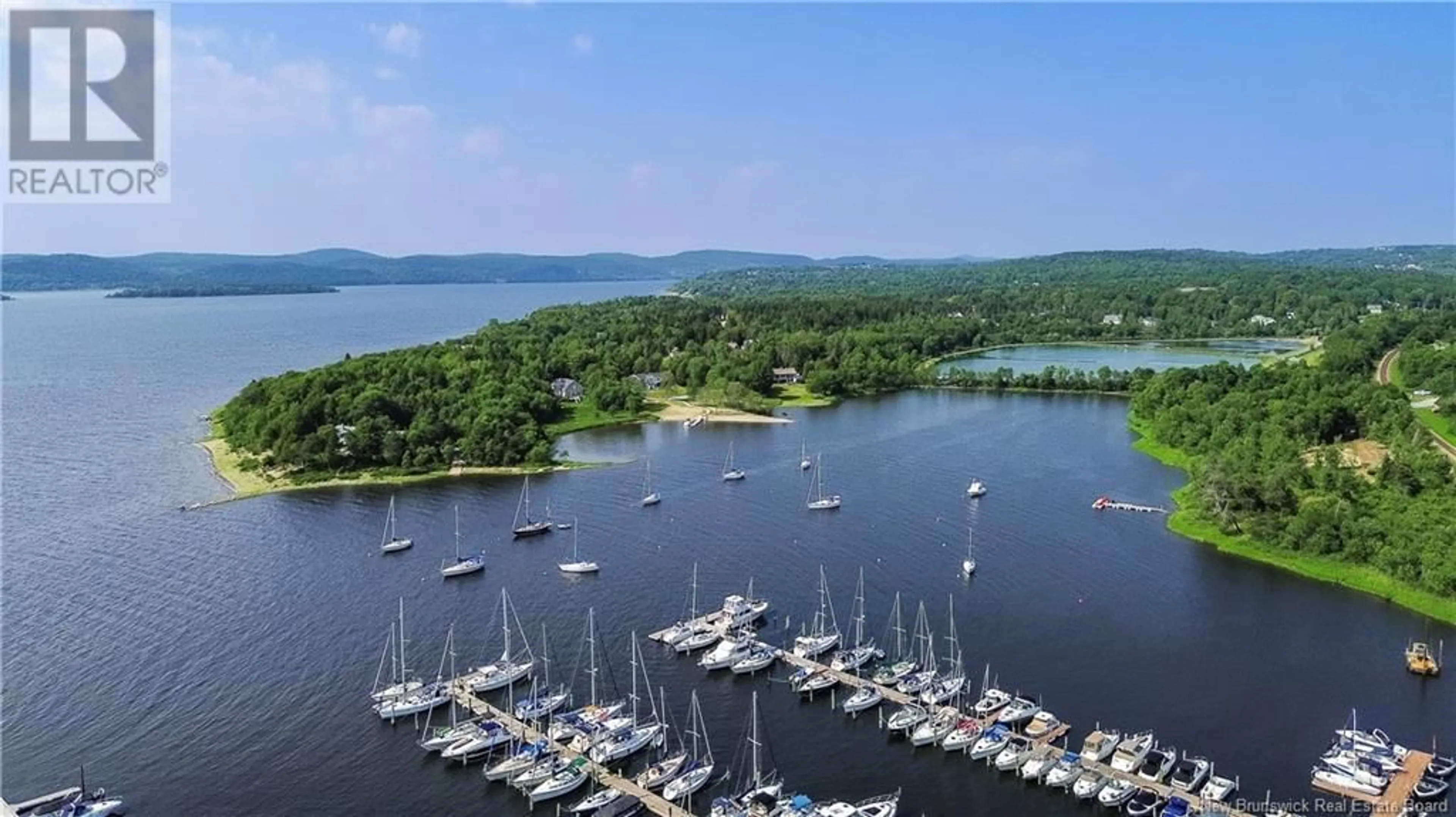A pic from outside/outdoor area/front of a property/back of a property/a pic from drone, water/lake/river/ocean view for 37 MALISEET DRIVE, Rothesay New Brunswick E2E2G3