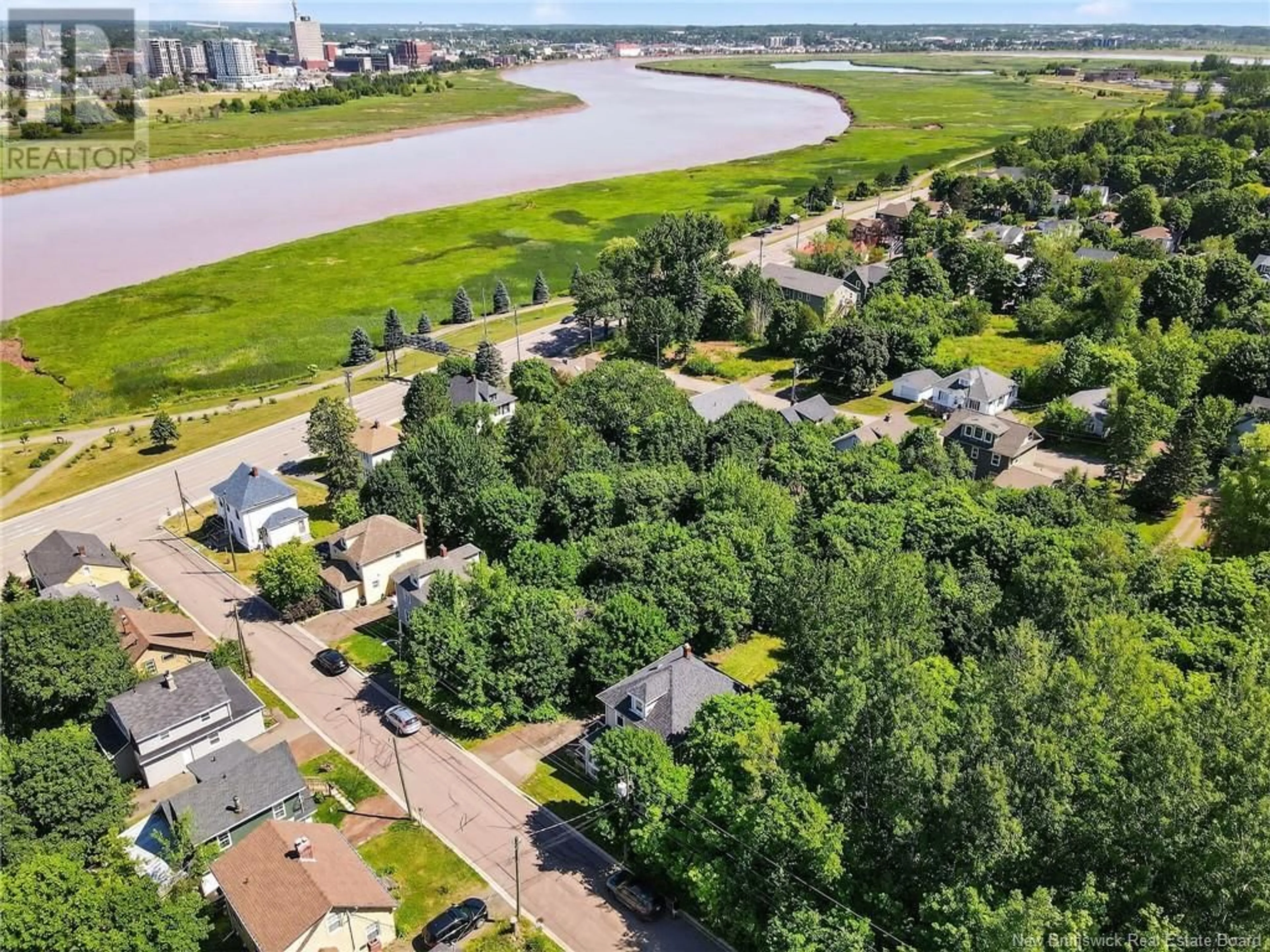 A pic from outside/outdoor area/front of a property/back of a property/a pic from drone, water/lake/river/ocean view for 122 RIVERCREST AVENUE, Riverview New Brunswick E1B1M7