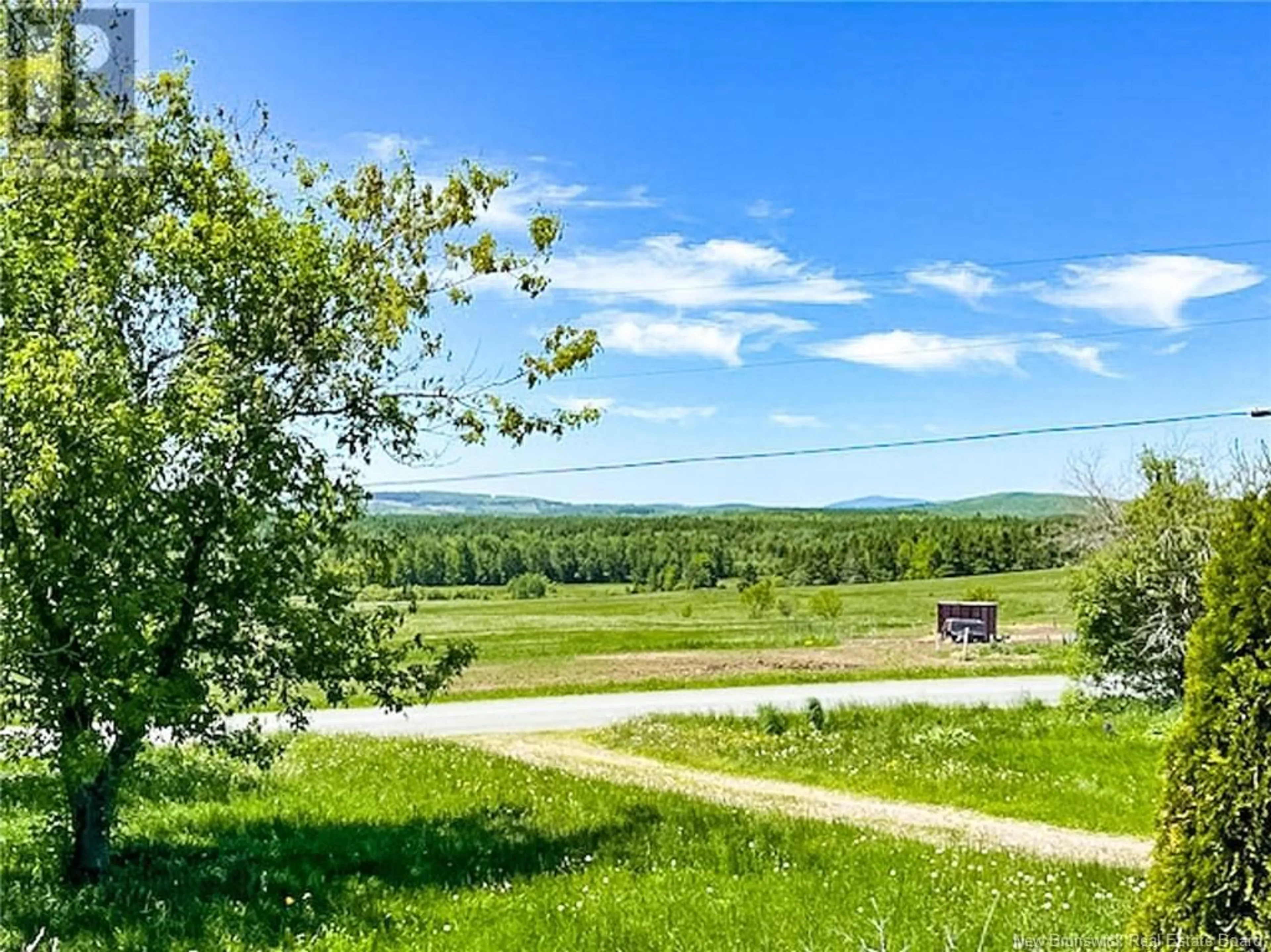 A pic from outside/outdoor area/front of a property/back of a property/a pic from drone, water/lake/river/ocean view for 689 KNOWLESVILLE ROAD, Knowlesville New Brunswick E7L4N9