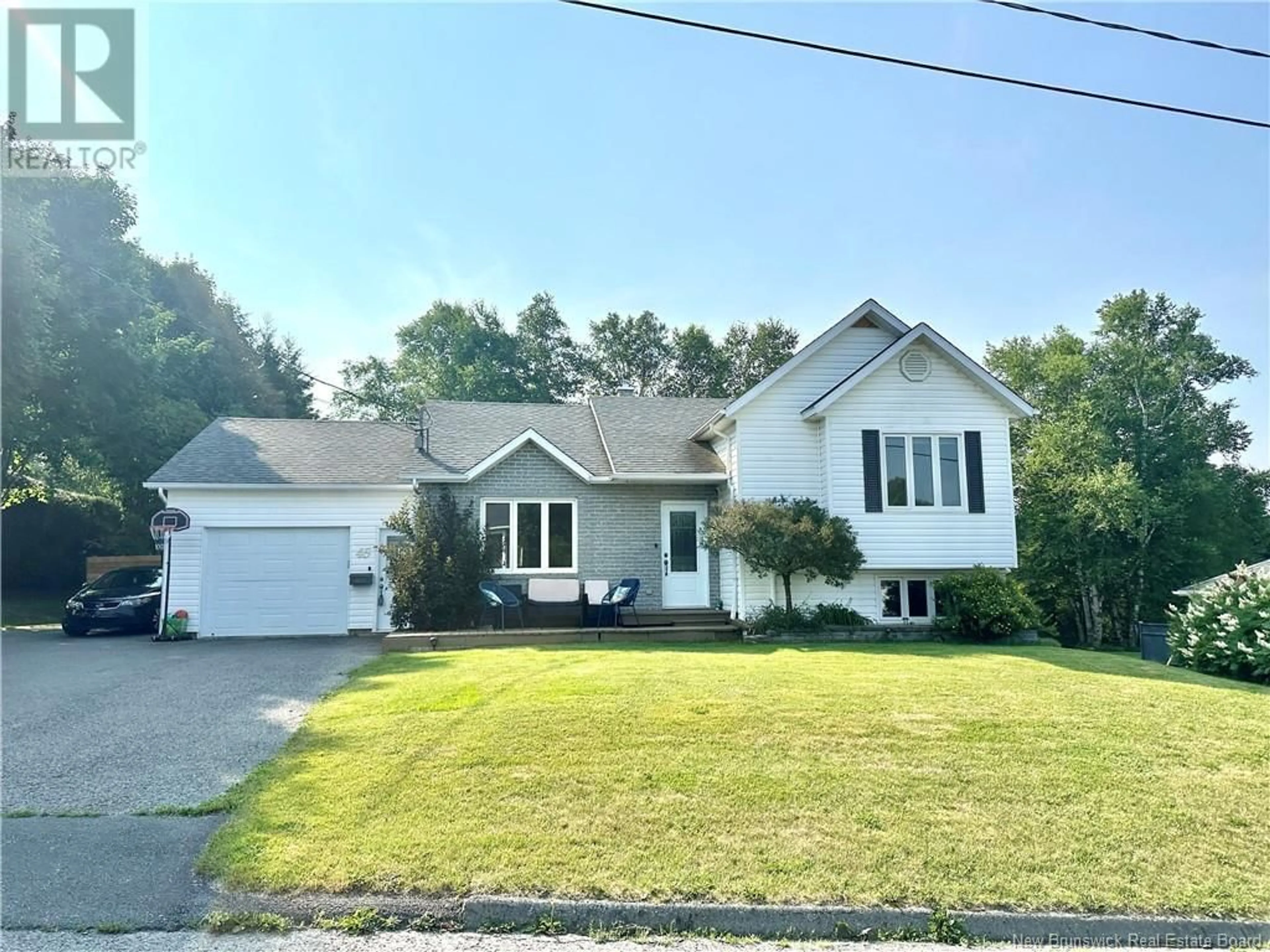 A pic from outside/outdoor area/front of a property/back of a property/a pic from drone, street for 45 MGR DIONNE AVENUE, Edmundston New Brunswick E3V4B2