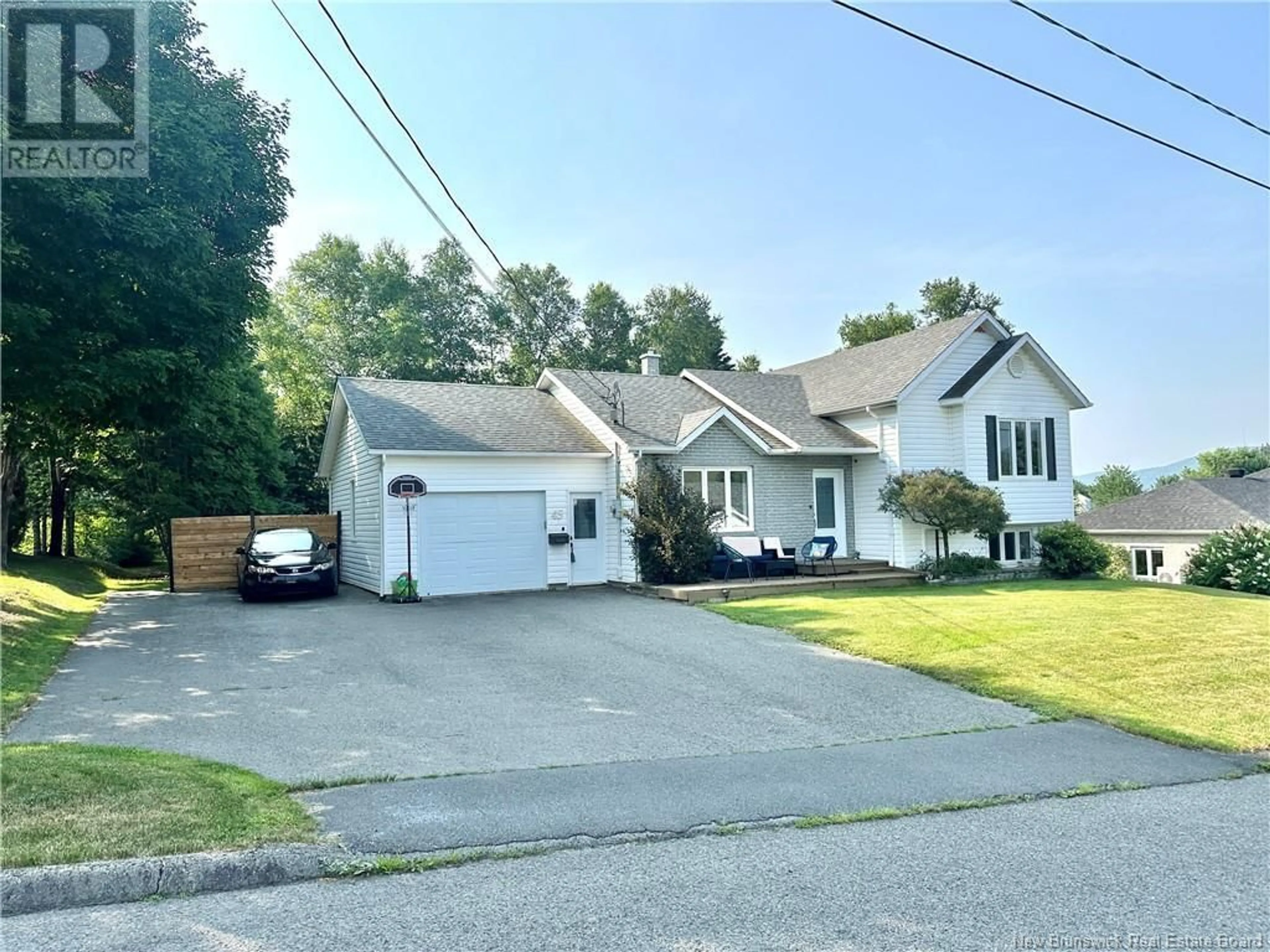 A pic from outside/outdoor area/front of a property/back of a property/a pic from drone, street for 45 MGR DIONNE AVENUE, Edmundston New Brunswick E3V4B2