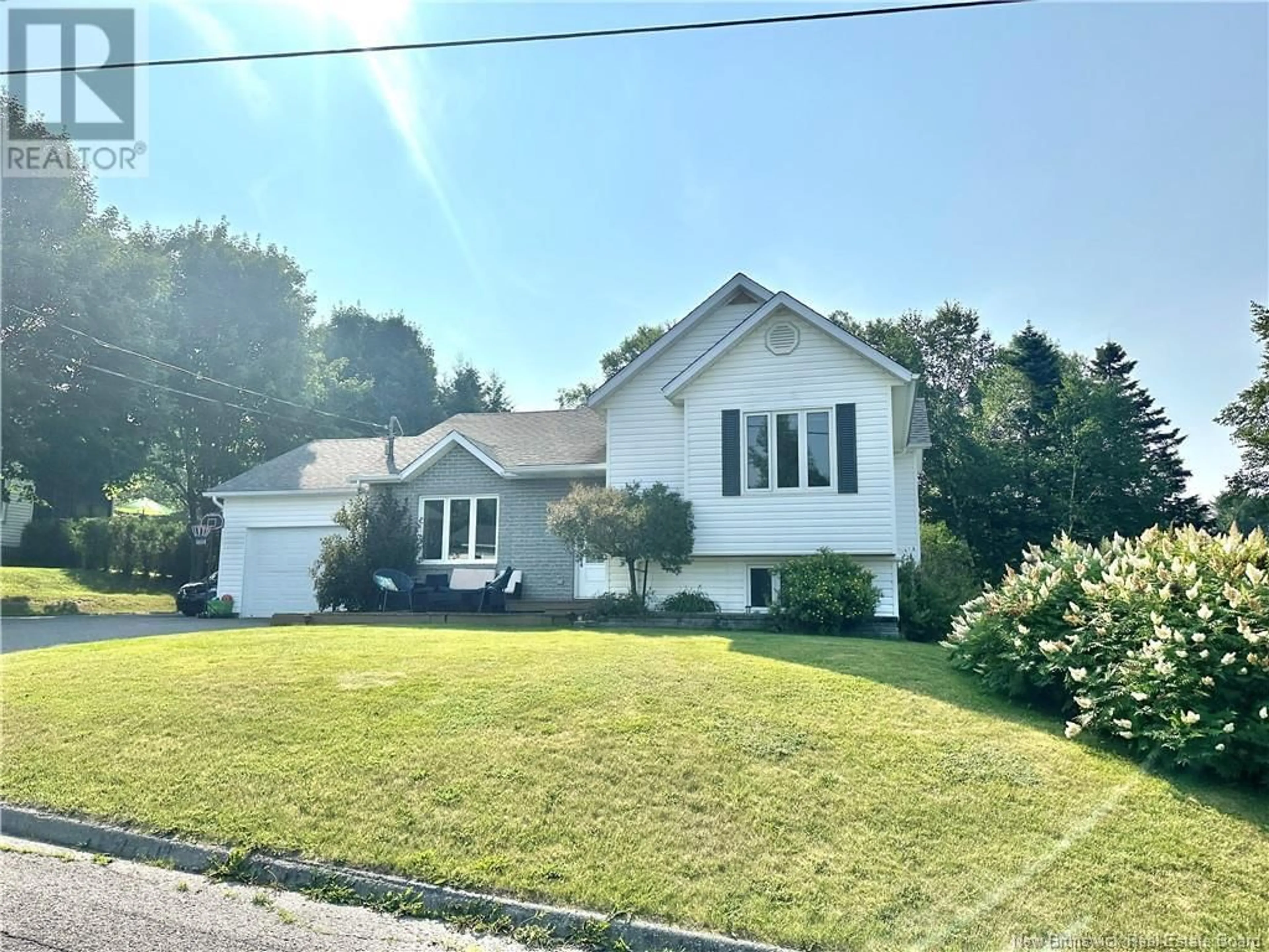 Home with vinyl exterior material, street for 45 MGR DIONNE AVENUE, Edmundston New Brunswick E3V4B2