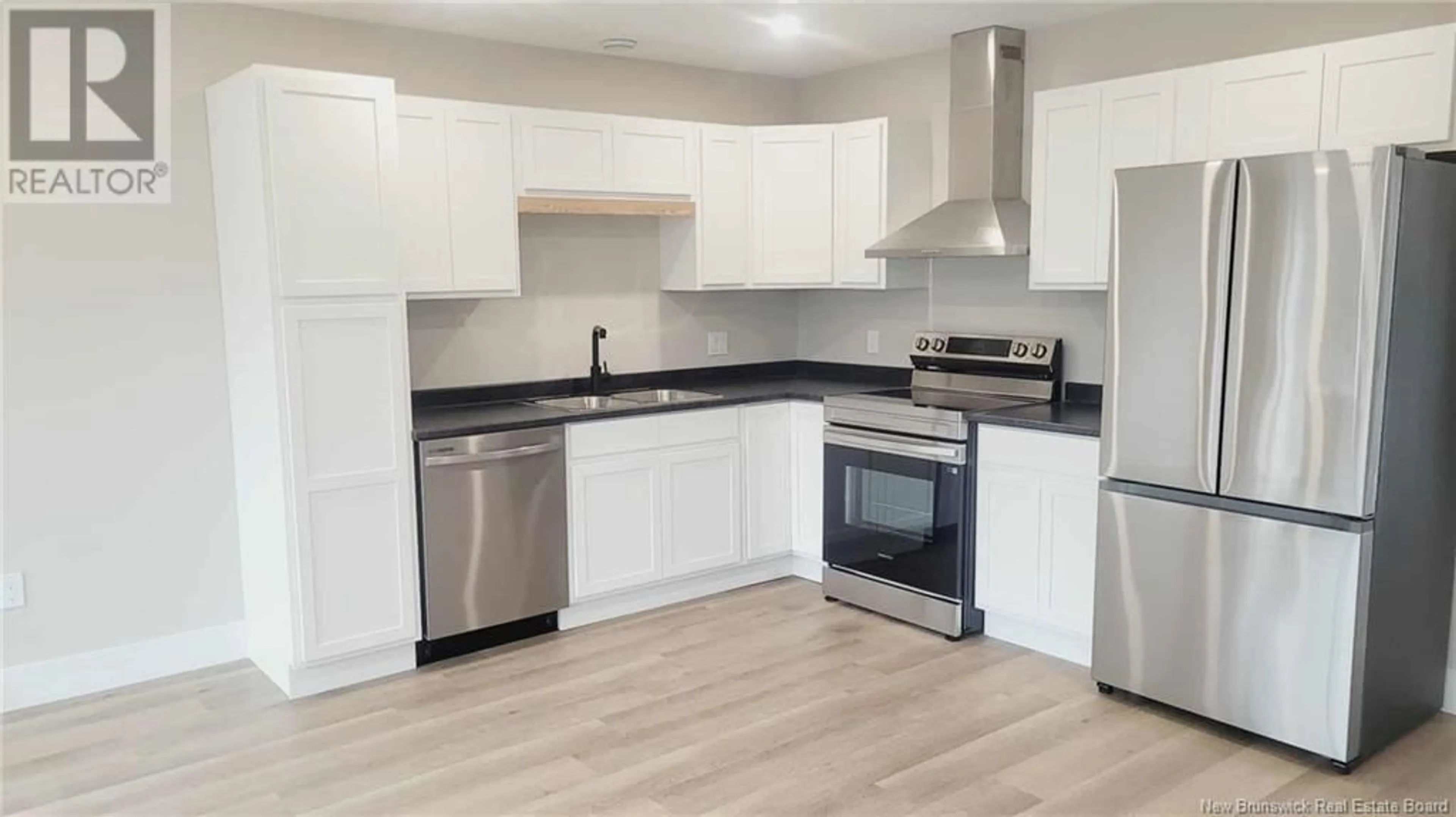 Open concept kitchen, wood/laminate floor for 138 ARLINGTON CRESCENT, Saint John New Brunswick E2K0G4