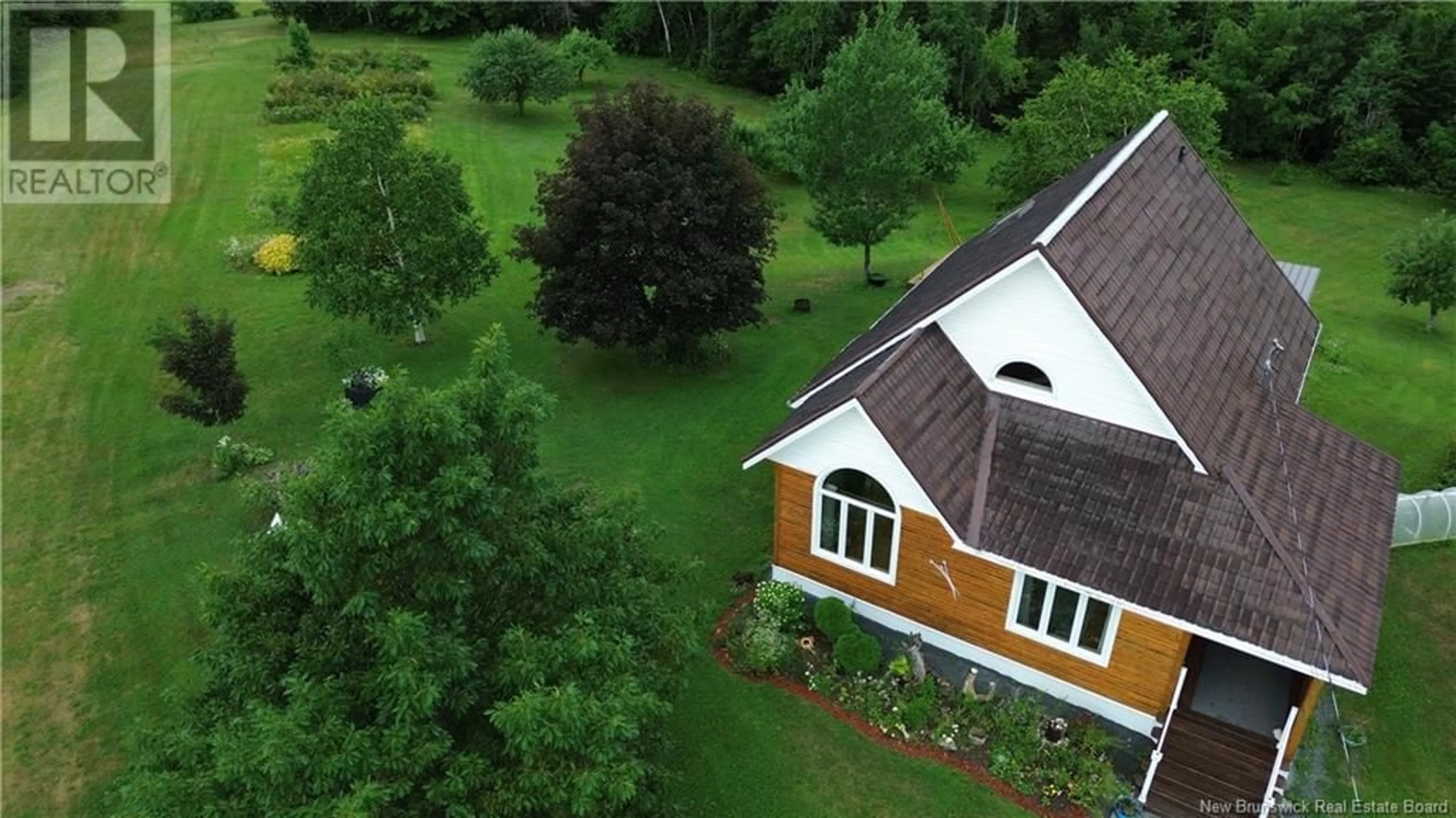 A pic from outside/outdoor area/front of a property/back of a property/a pic from drone, building for 2104 CHEMIN CORMIER, Sainte-Louise New Brunswick E8K2X6