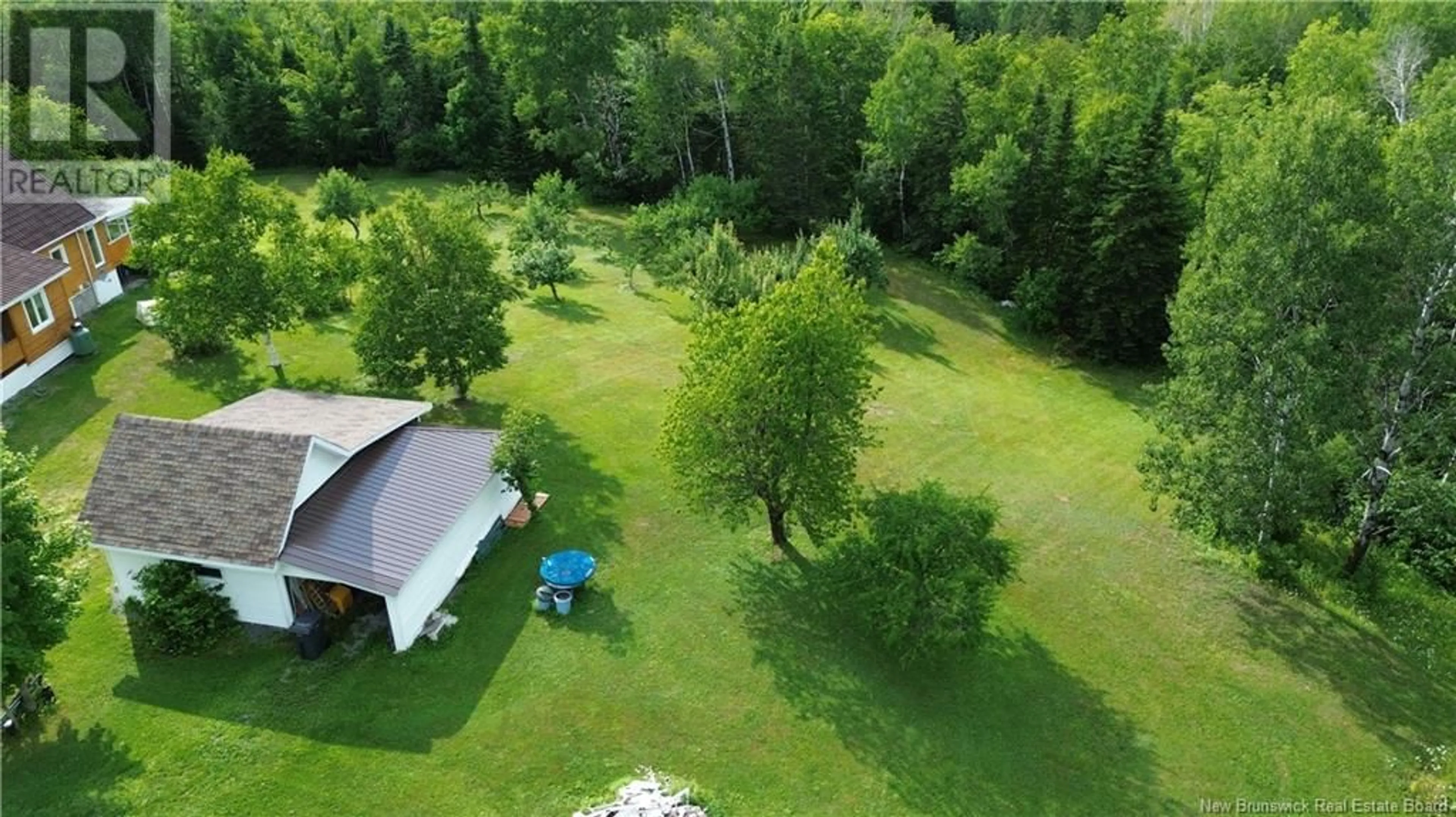 A pic from outside/outdoor area/front of a property/back of a property/a pic from drone, unknown for 2104 CHEMIN CORMIER, Sainte-Louise New Brunswick E8K2X6