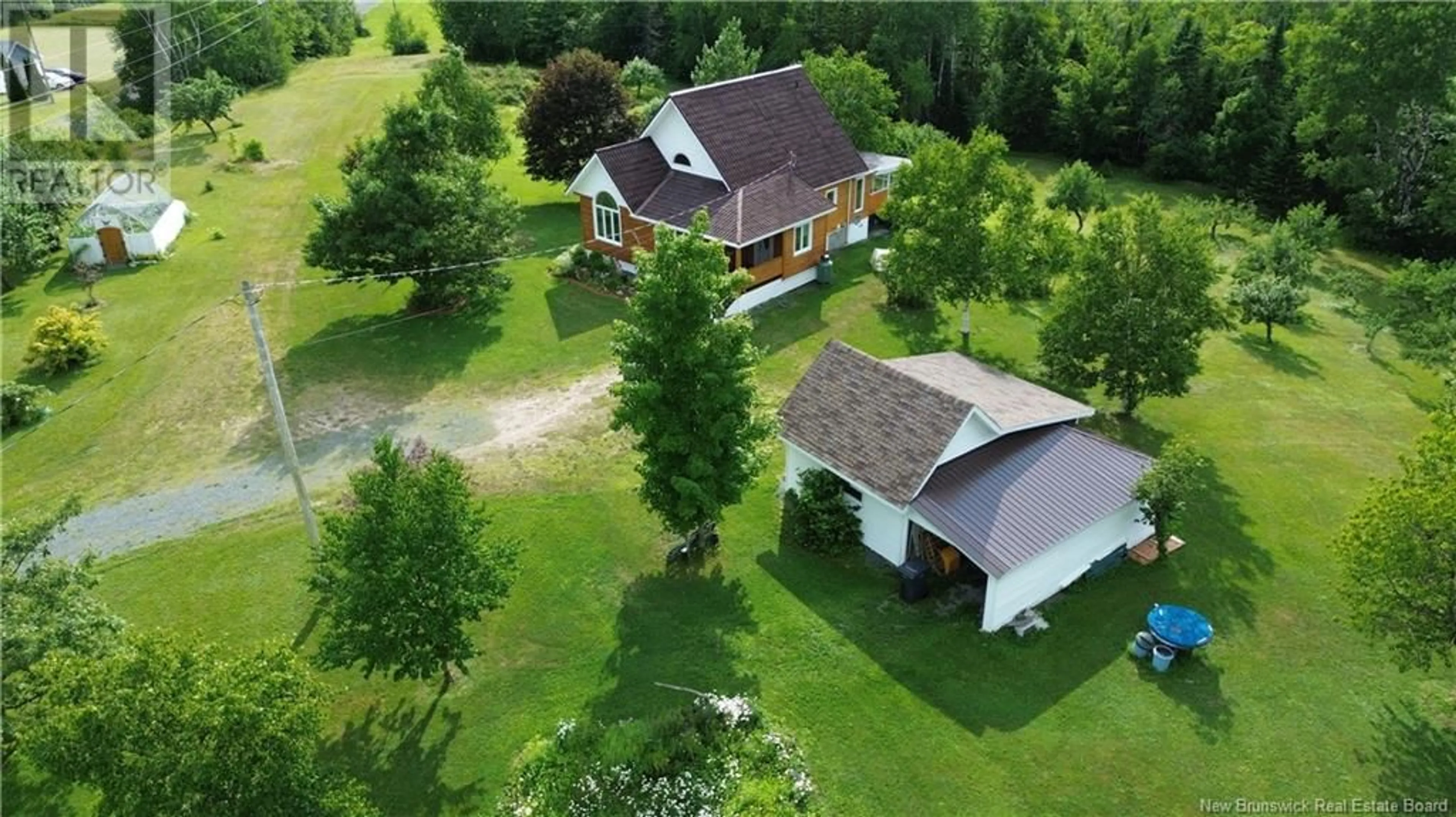A pic from outside/outdoor area/front of a property/back of a property/a pic from drone, building for 2104 CHEMIN CORMIER, Sainte-Louise New Brunswick E8K2X6