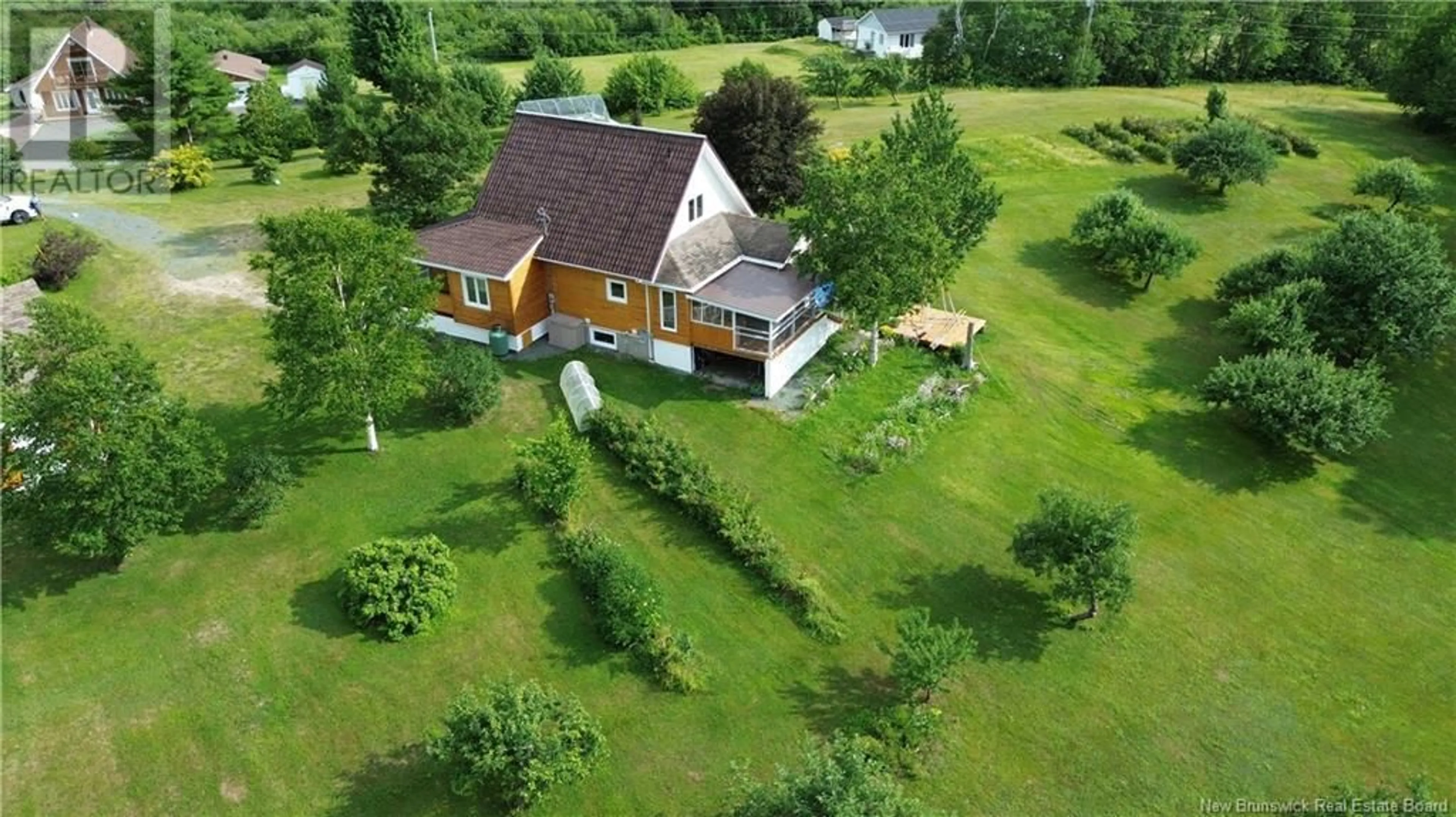 A pic from outside/outdoor area/front of a property/back of a property/a pic from drone, building for 2104 CHEMIN CORMIER, Sainte-Louise New Brunswick E8K2X6