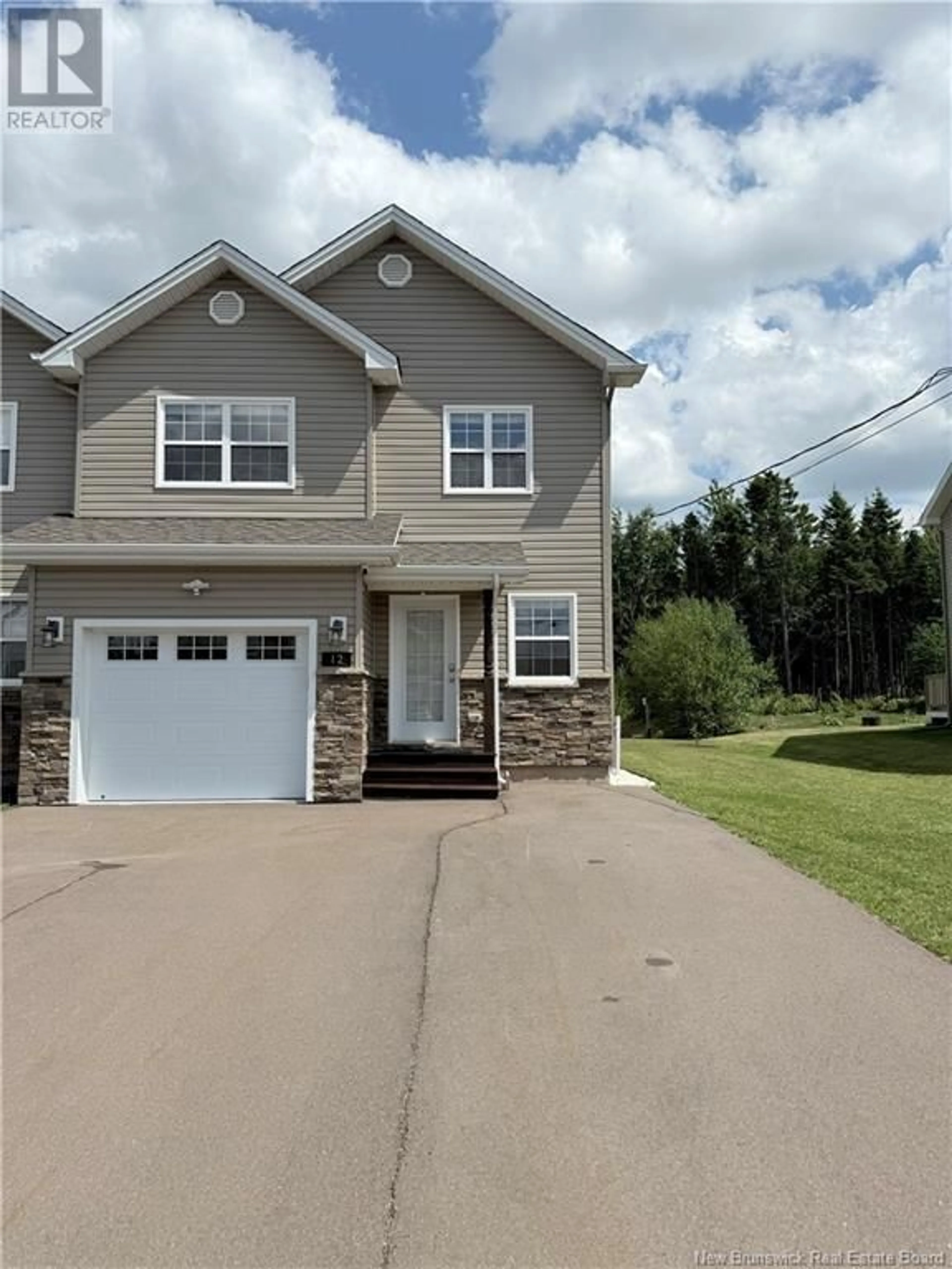 Home with vinyl exterior material, street for 12 POITOU, Dieppe New Brunswick E1A9V1