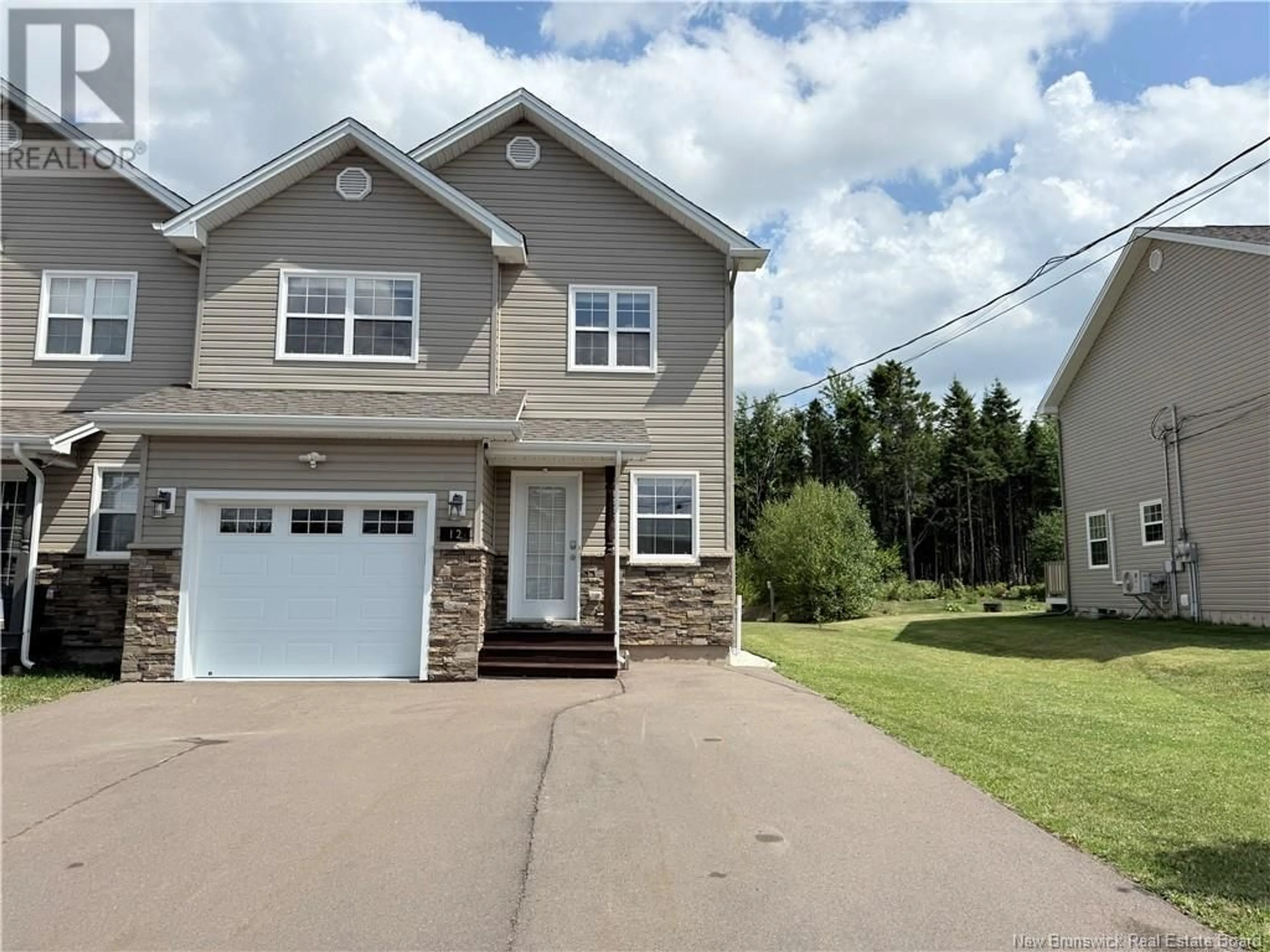 Home with vinyl exterior material, street for 12 POITOU, Dieppe New Brunswick E1A9V1