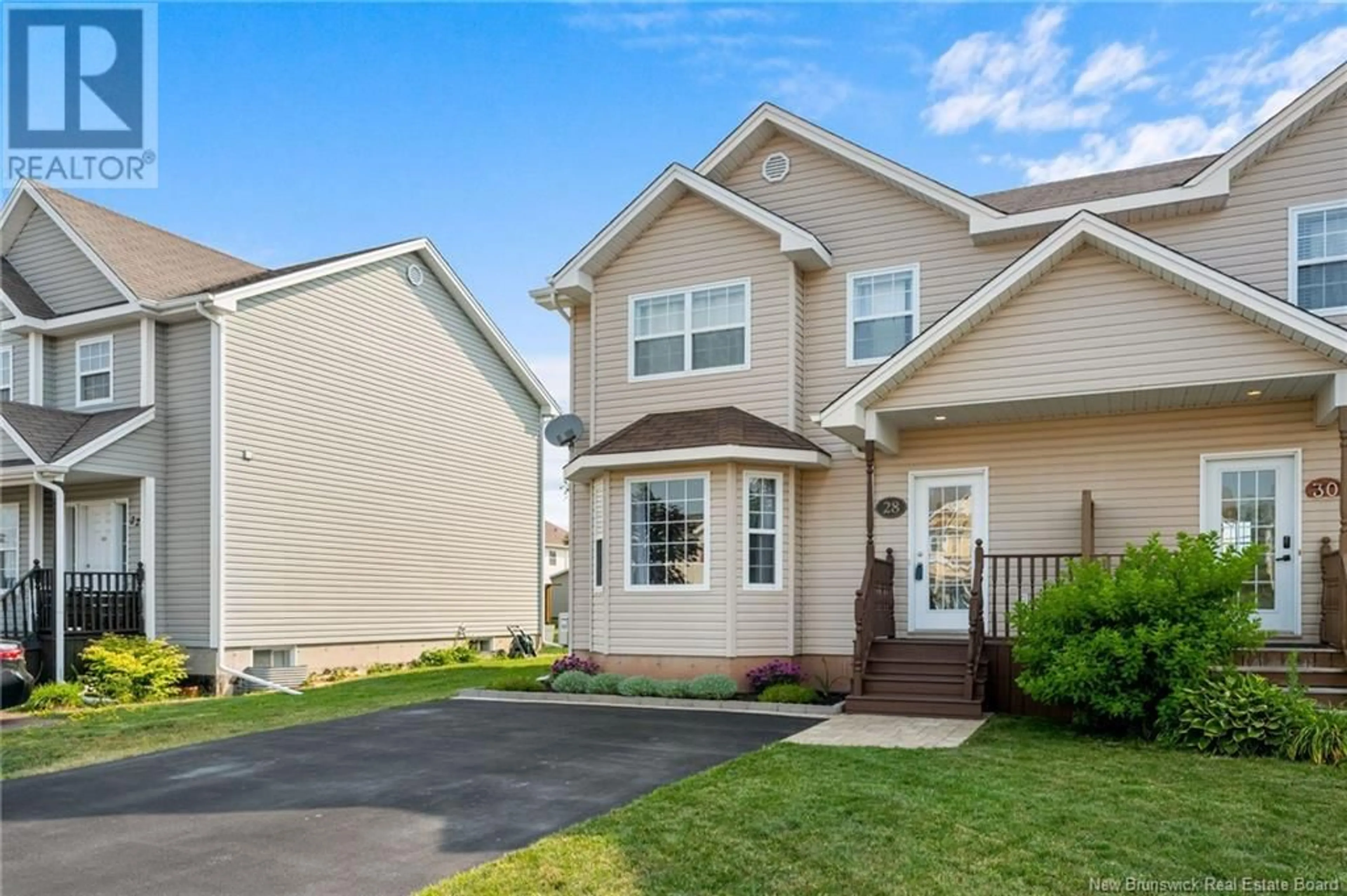 Home with vinyl exterior material, street for 28 CABERNET COURT, Dieppe New Brunswick E1A0H5