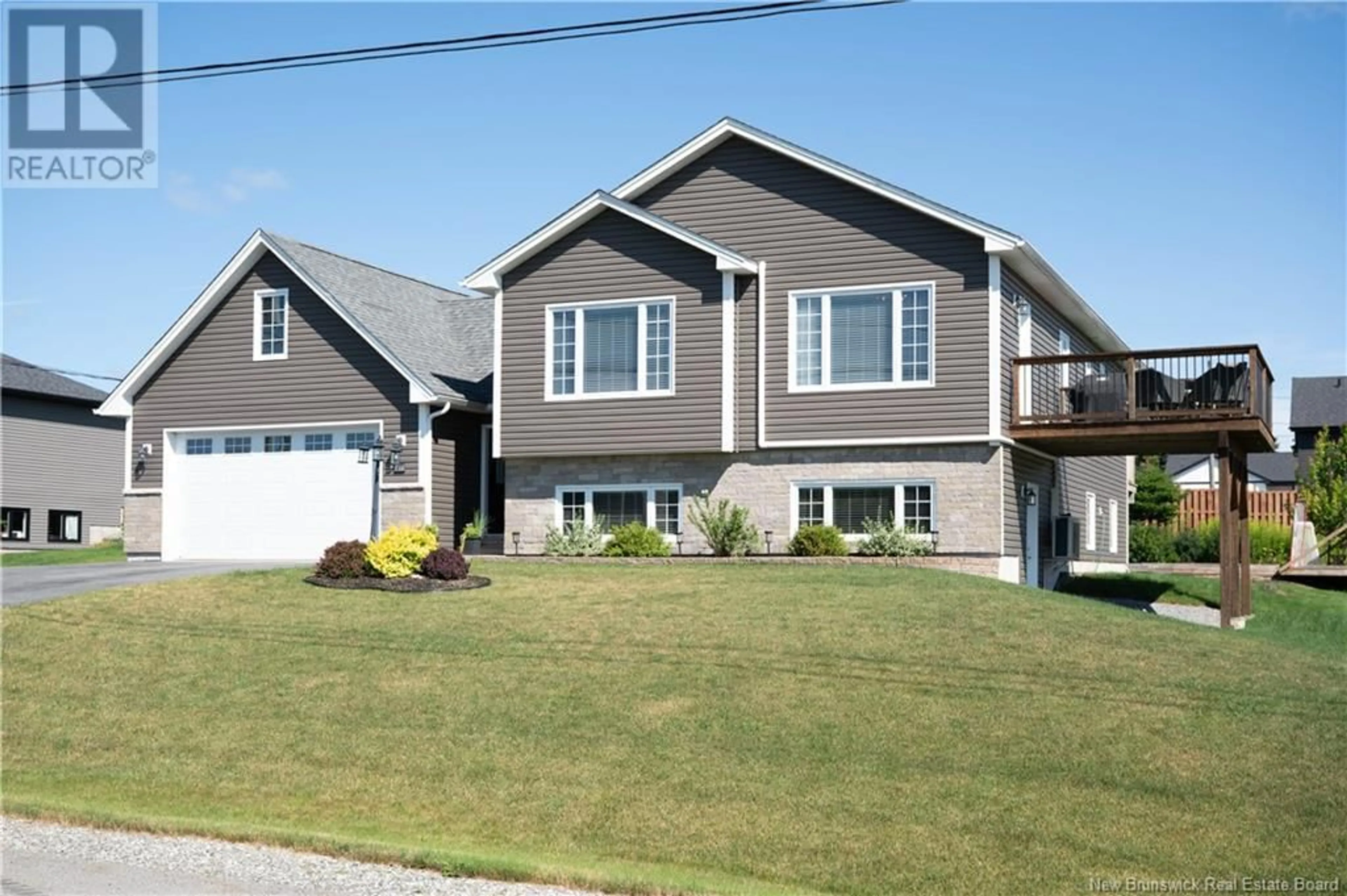 Home with vinyl exterior material, street for 47 NIGHTINGALE LANE, Quispamsis New Brunswick E2E3T1