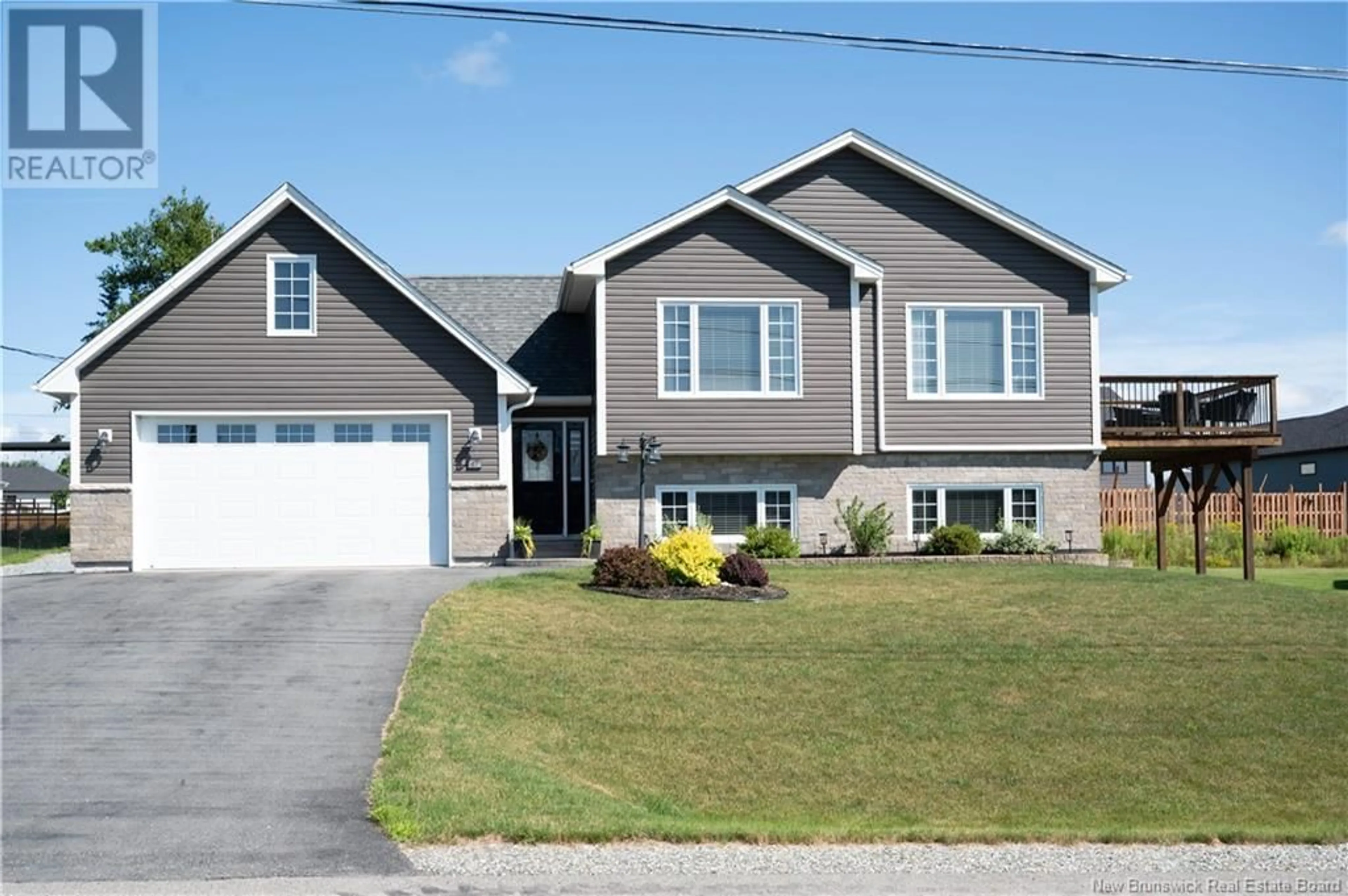 Home with vinyl exterior material, street for 47 NIGHTINGALE LANE, Quispamsis New Brunswick E2E3T1