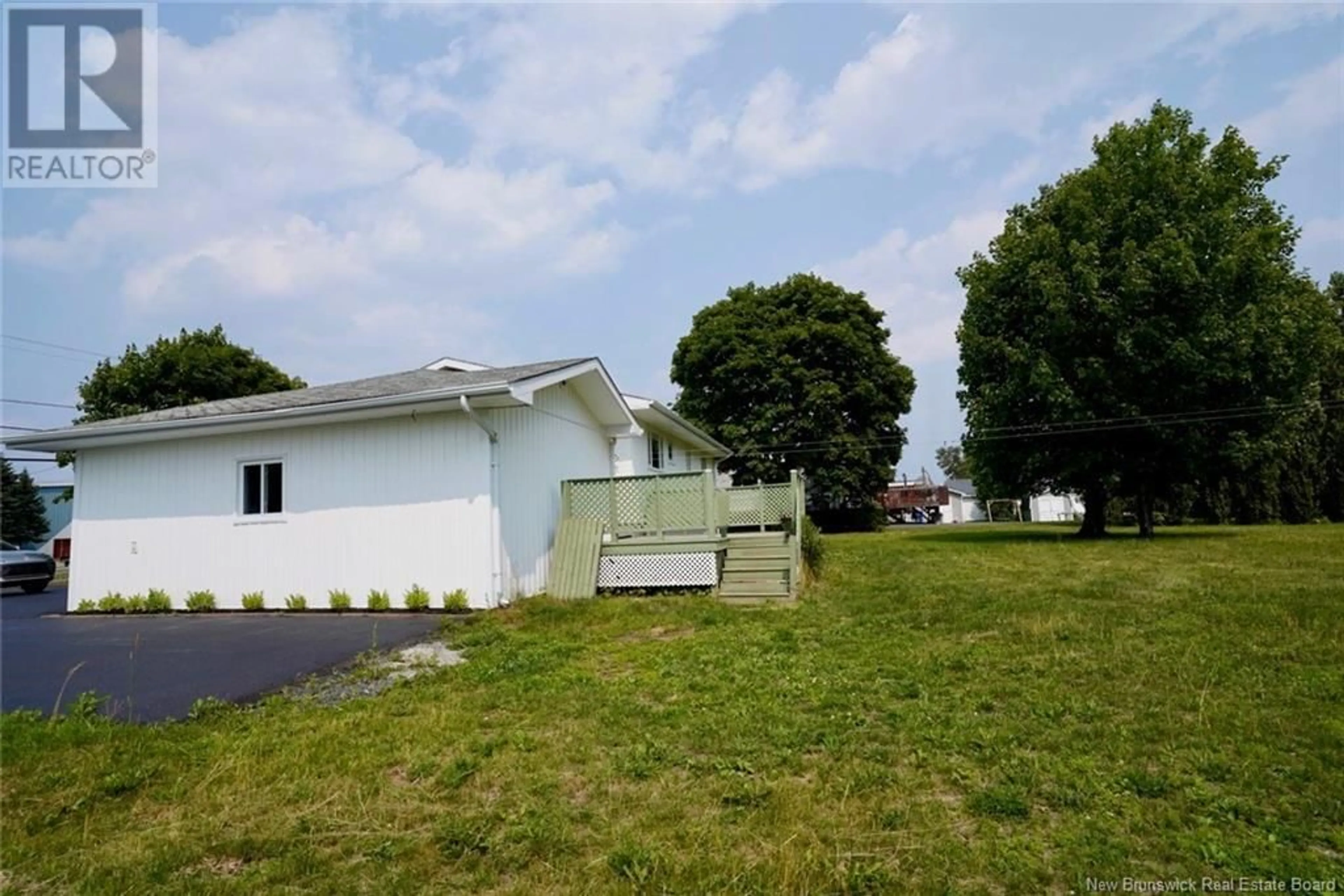A pic from outside/outdoor area/front of a property/back of a property/a pic from drone, unknown for 221 RUE PARC, Beresford New Brunswick E8K1V9
