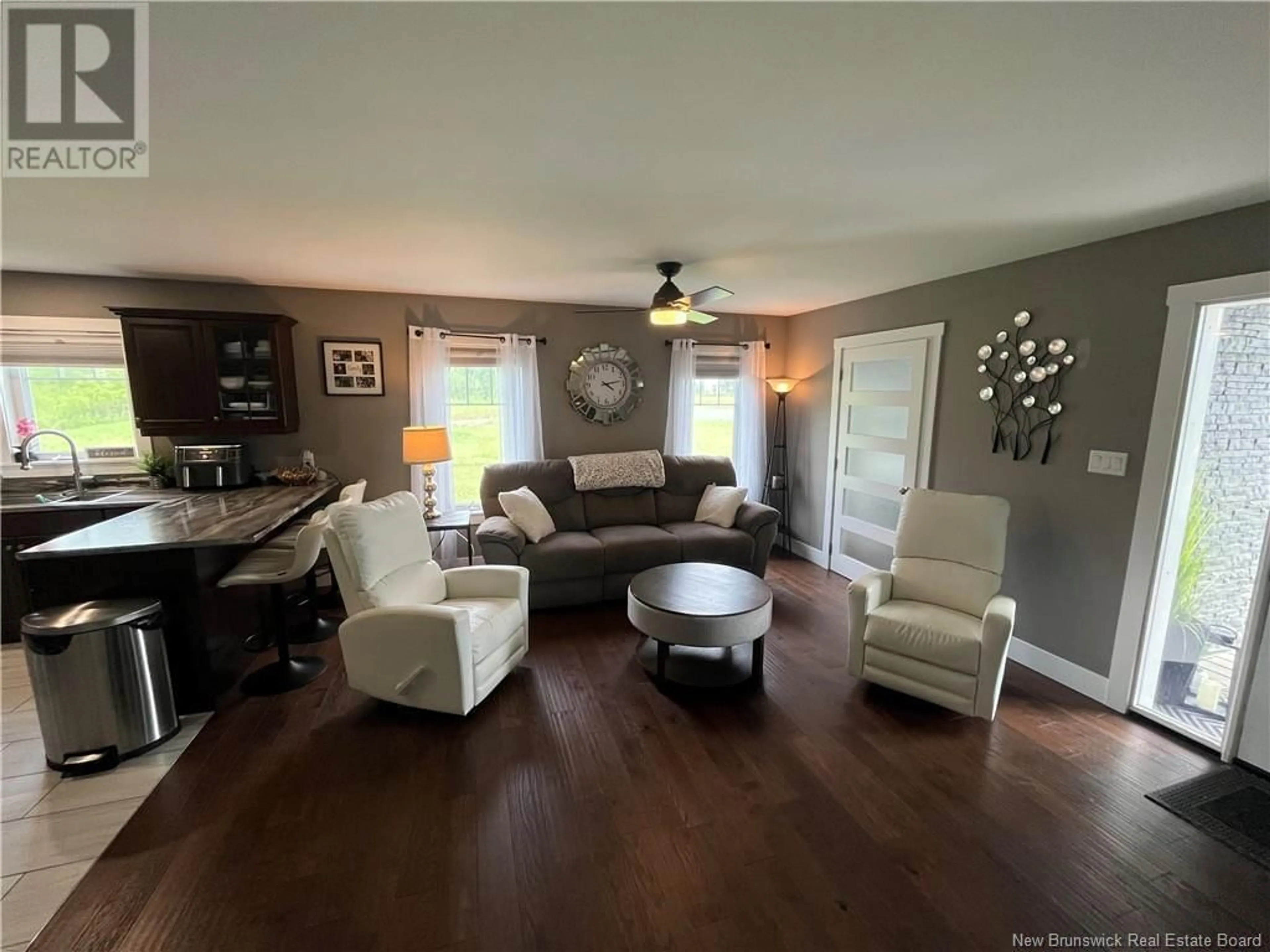 Living room with furniture, wood/laminate floor for 17 NIGHTINGALE COURT, Florenceville-Bristol New Brunswick E7L0C6
