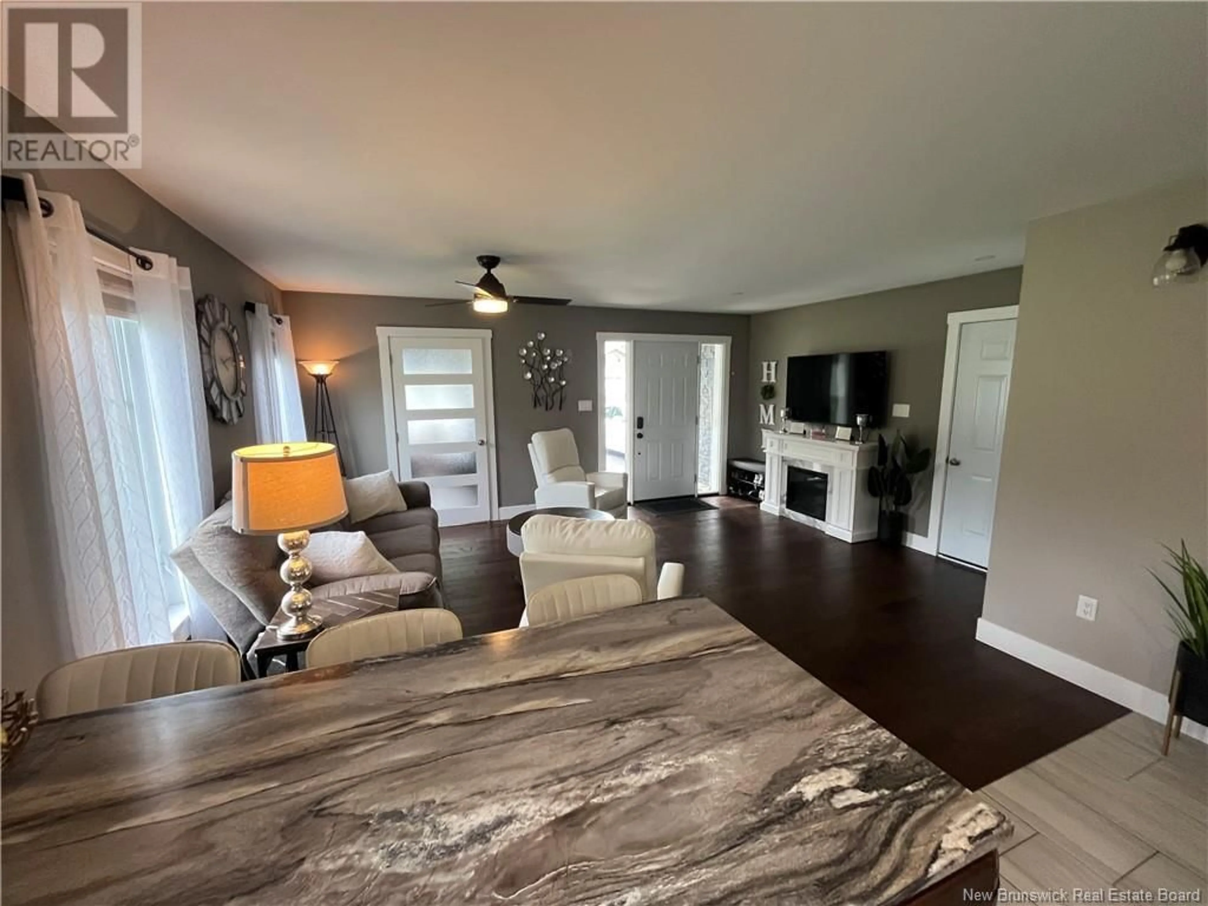 Living room with furniture, wood/laminate floor for 17 NIGHTINGALE COURT, Florenceville-Bristol New Brunswick E7L0C6