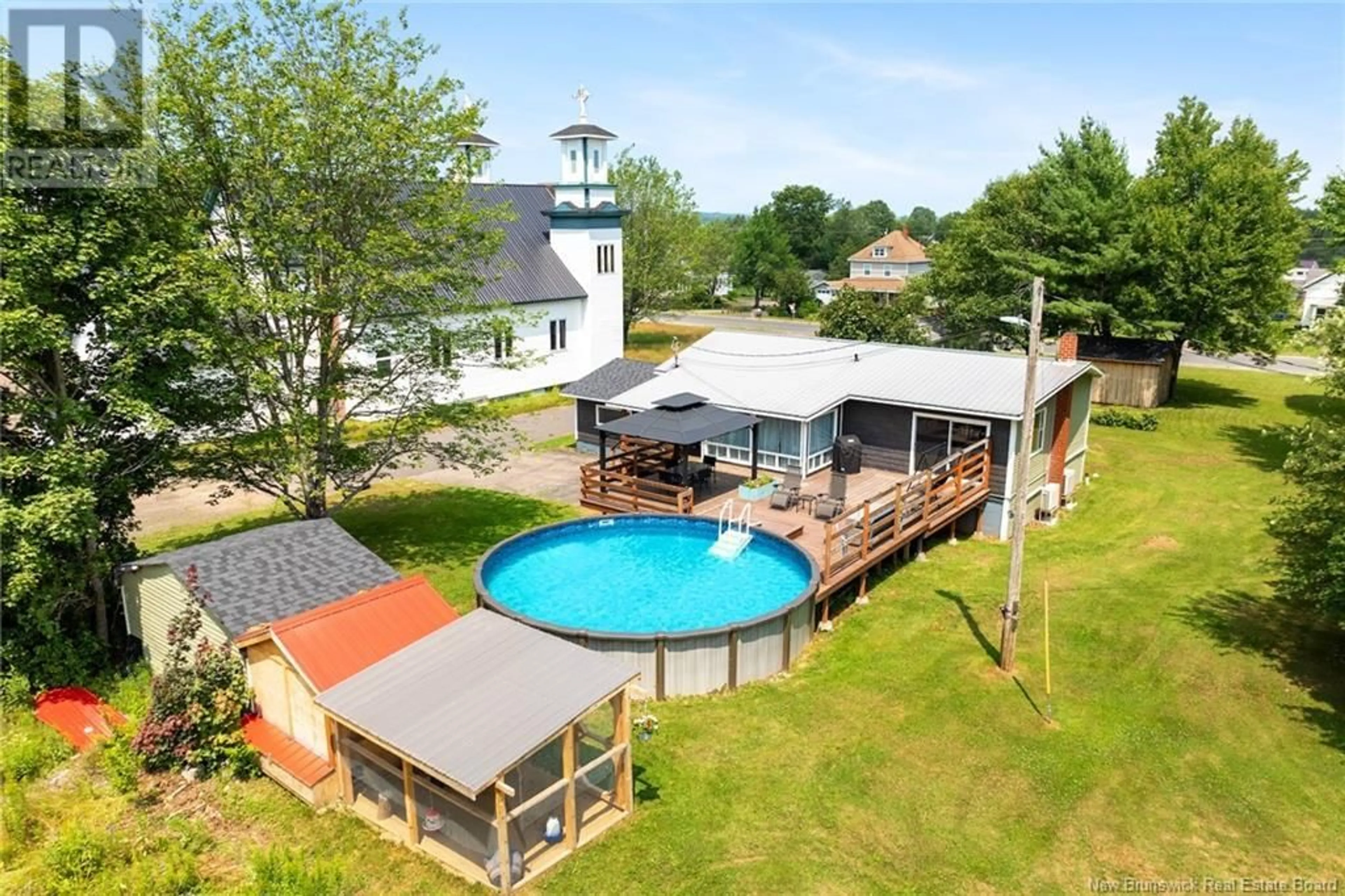 A pic from outside/outdoor area/front of a property/back of a property/a pic from drone, water/lake/river/ocean view for 52 KING STREET, Chipman New Brunswick E4A2H7