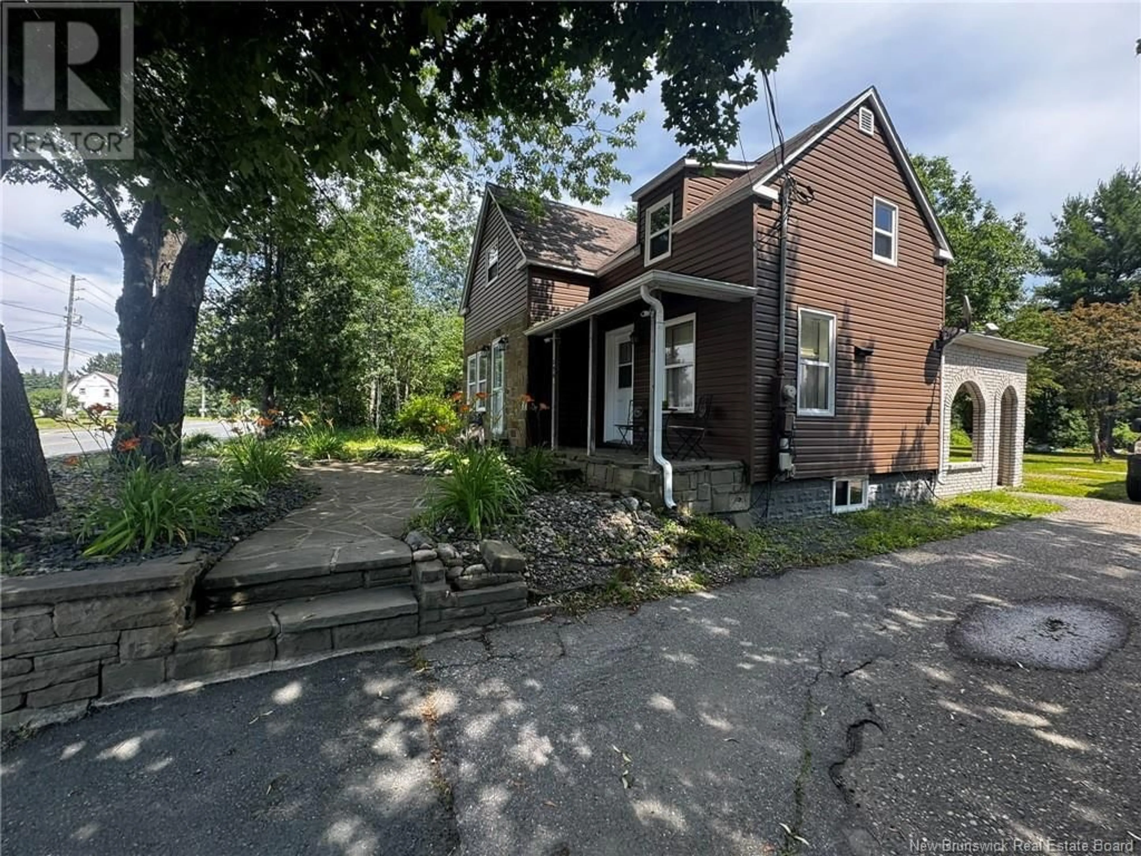 A pic from outside/outdoor area/front of a property/back of a property/a pic from drone, street for 296 WELLINGTON STREET, Miramichi New Brunswick E1N1P2