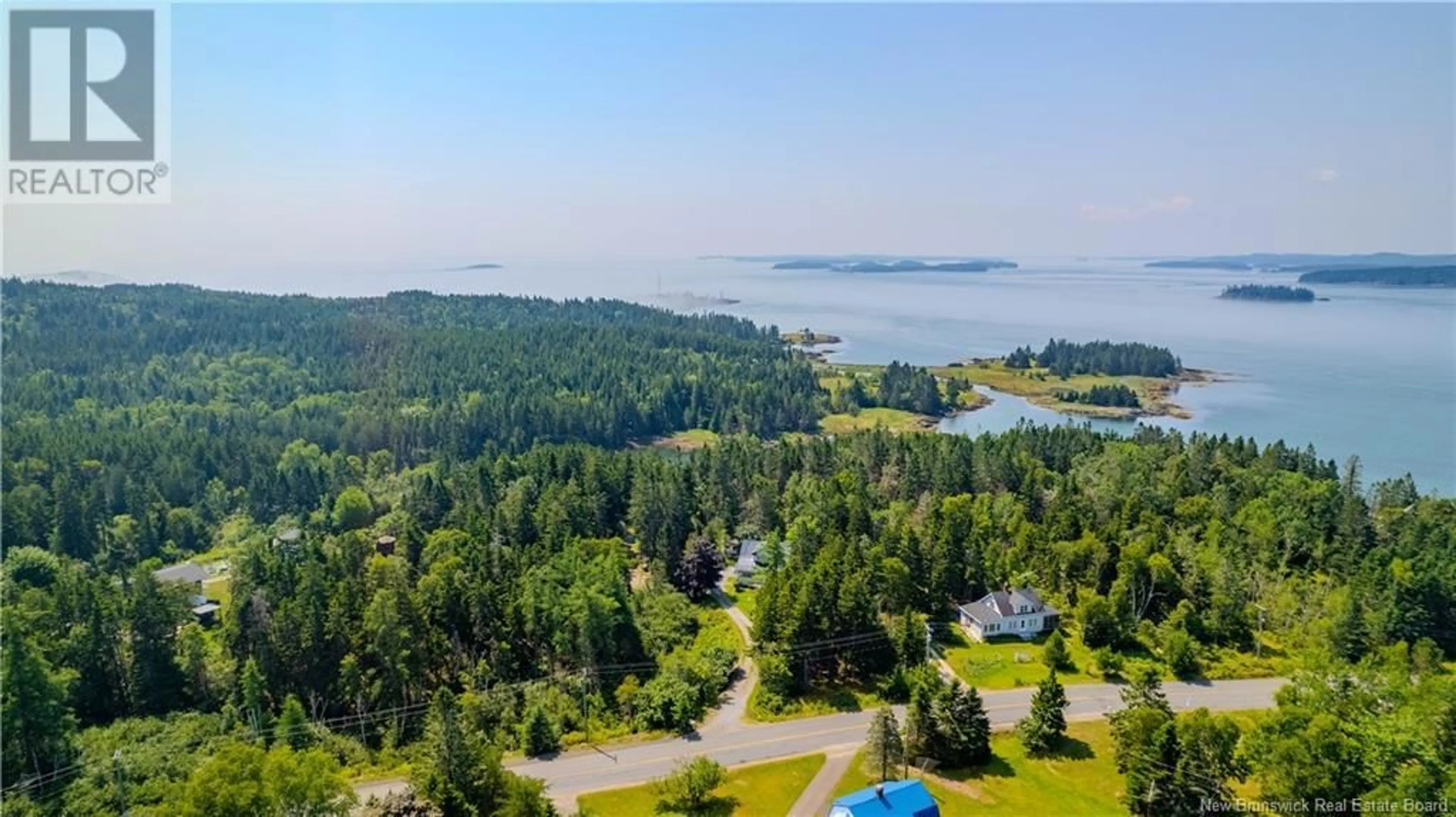 A pic from outside/outdoor area/front of a property/back of a property/a pic from drone, water/lake/river/ocean view for 1232 172 ROUTE ROUTE, L'etete New Brunswick E5C2R4