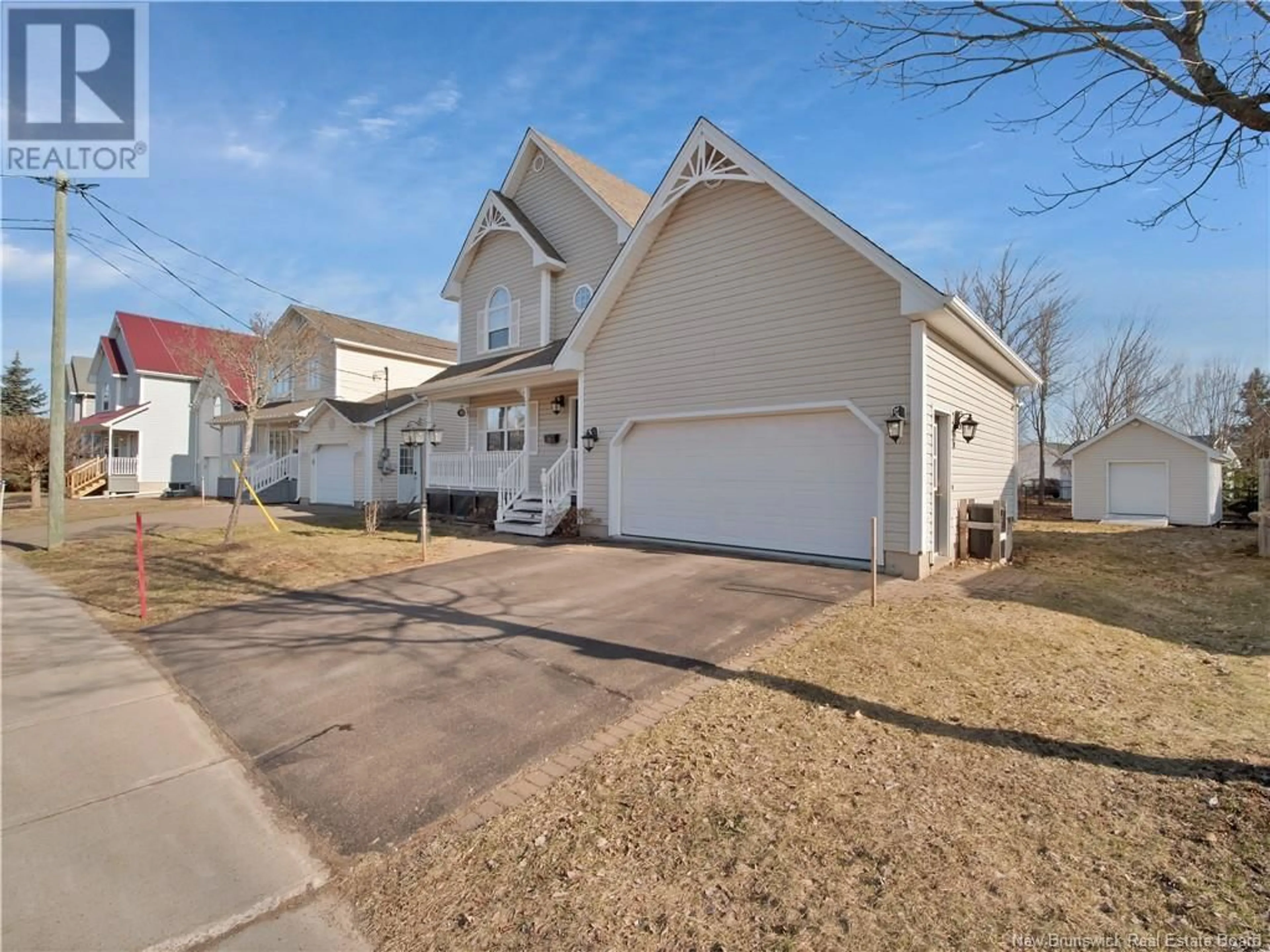 Home with vinyl exterior material, street for 291 TWIN OAKS DRIVE, Moncton New Brunswick E1G4W7