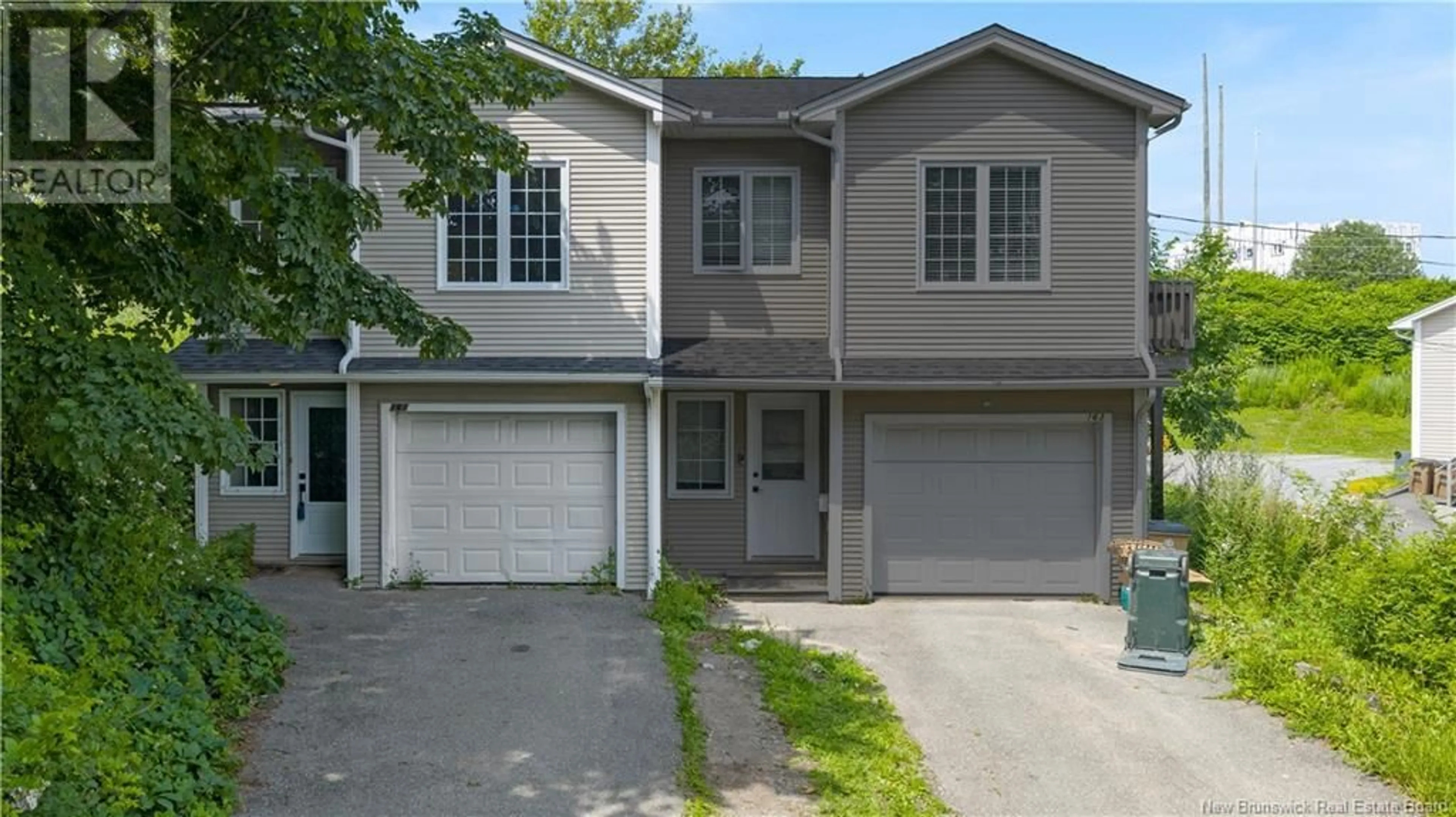 Home with vinyl exterior material, street for 161 OSBORNE AVENUE, Saint John New Brunswick E2K3K1