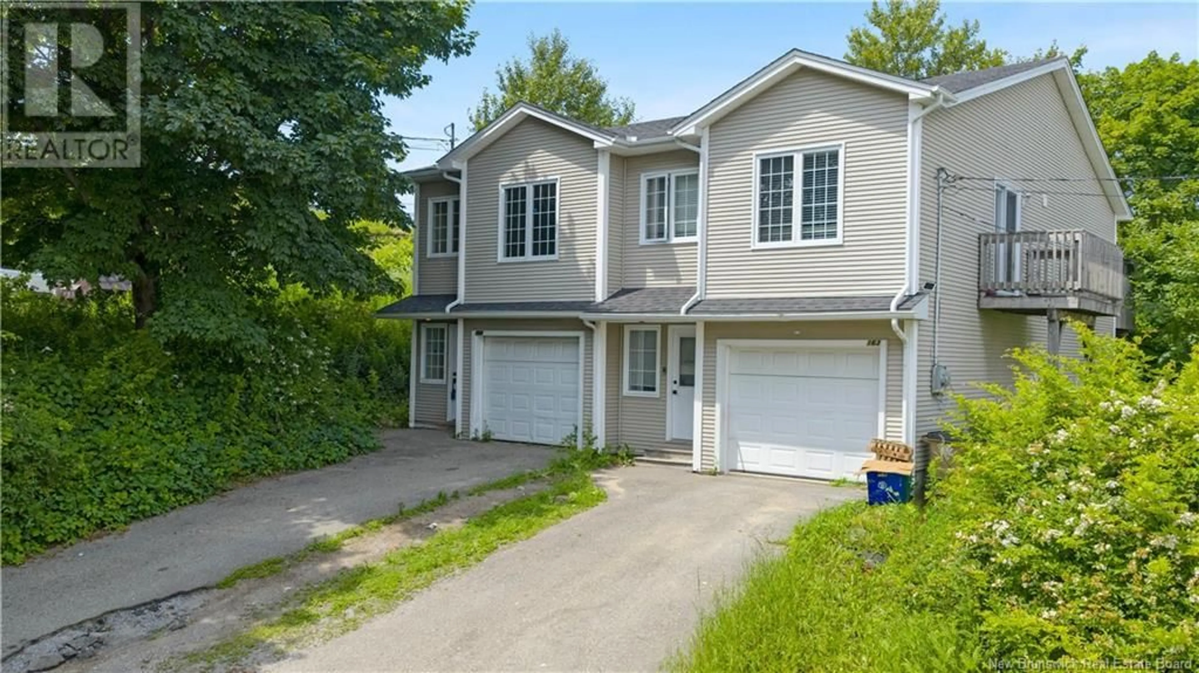 Home with vinyl exterior material, street for 161 OSBORNE AVENUE, Saint John New Brunswick E2K3K1
