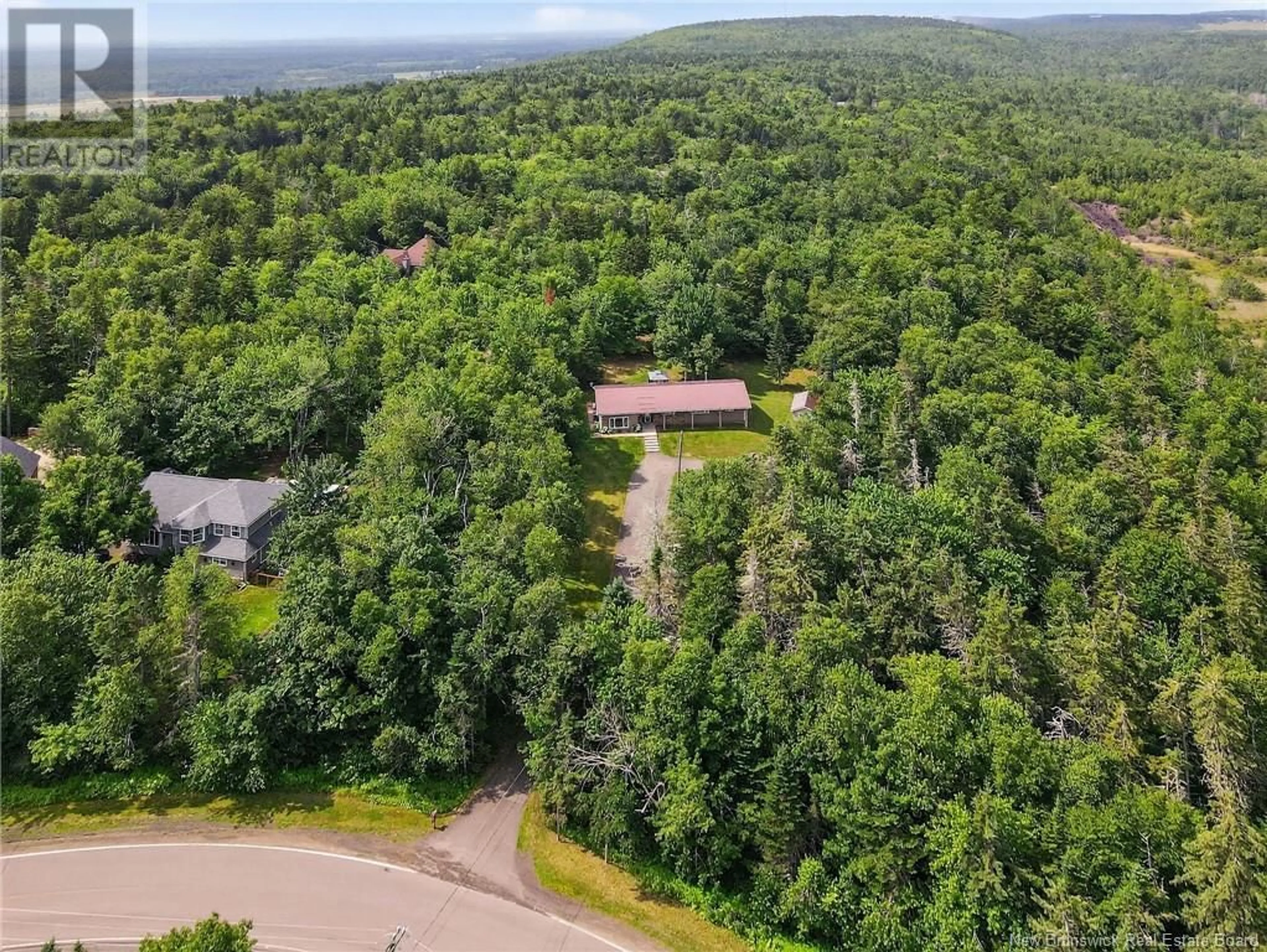 A pic from outside/outdoor area/front of a property/back of a property/a pic from drone, forest/trees view for 2382 ROUTE 490, Ammon New Brunswick E1G4R8