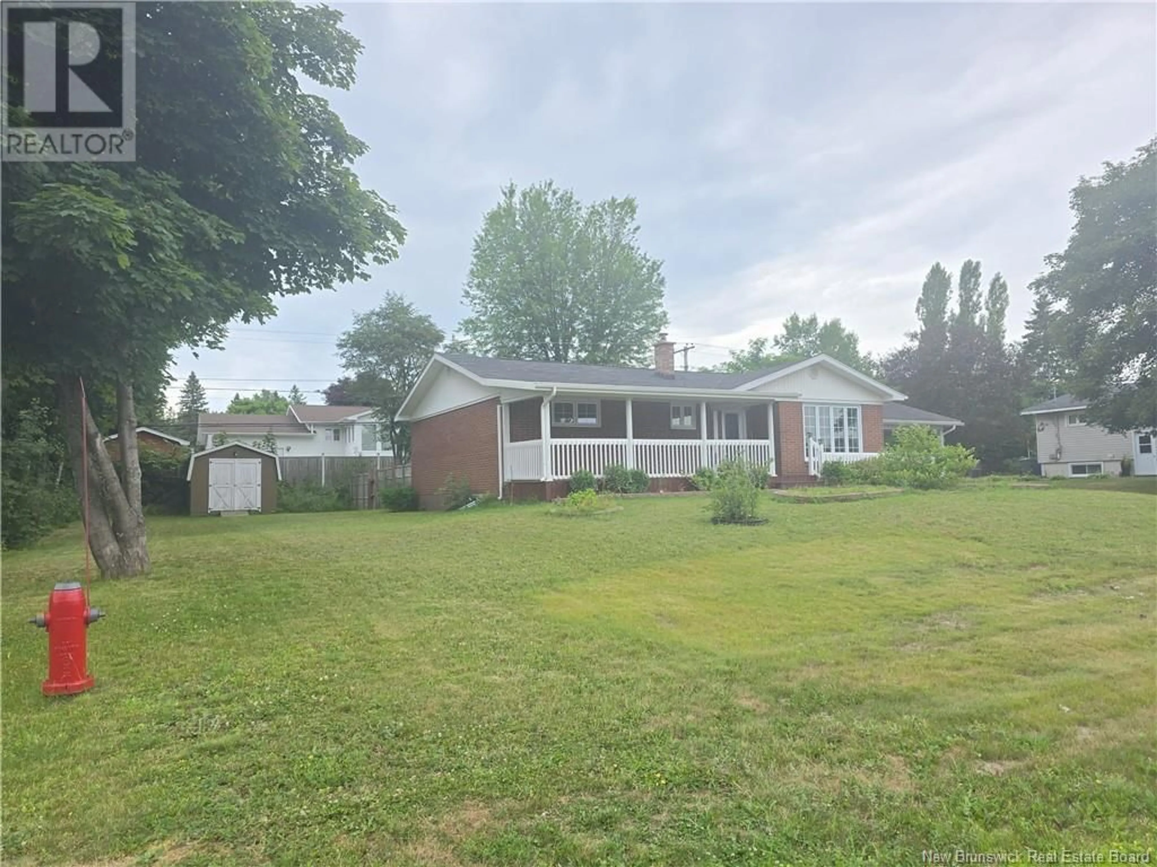 A pic from outside/outdoor area/front of a property/back of a property/a pic from drone, unknown for 1055 VANIER, Bathurst New Brunswick E2A3N4