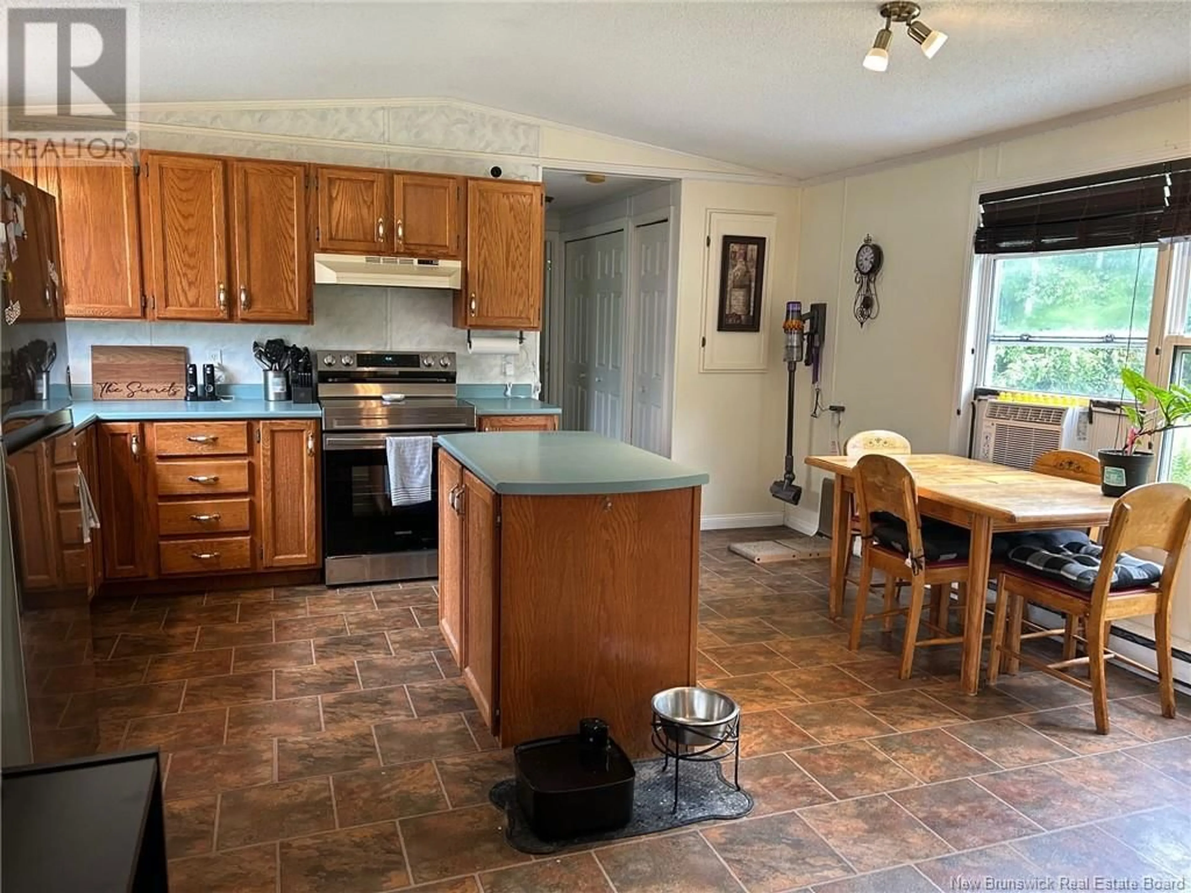 Open concept kitchen, ceramic/tile floor for 76 CRYSTAL DRIVE, Waasis New Brunswick E3B9B6