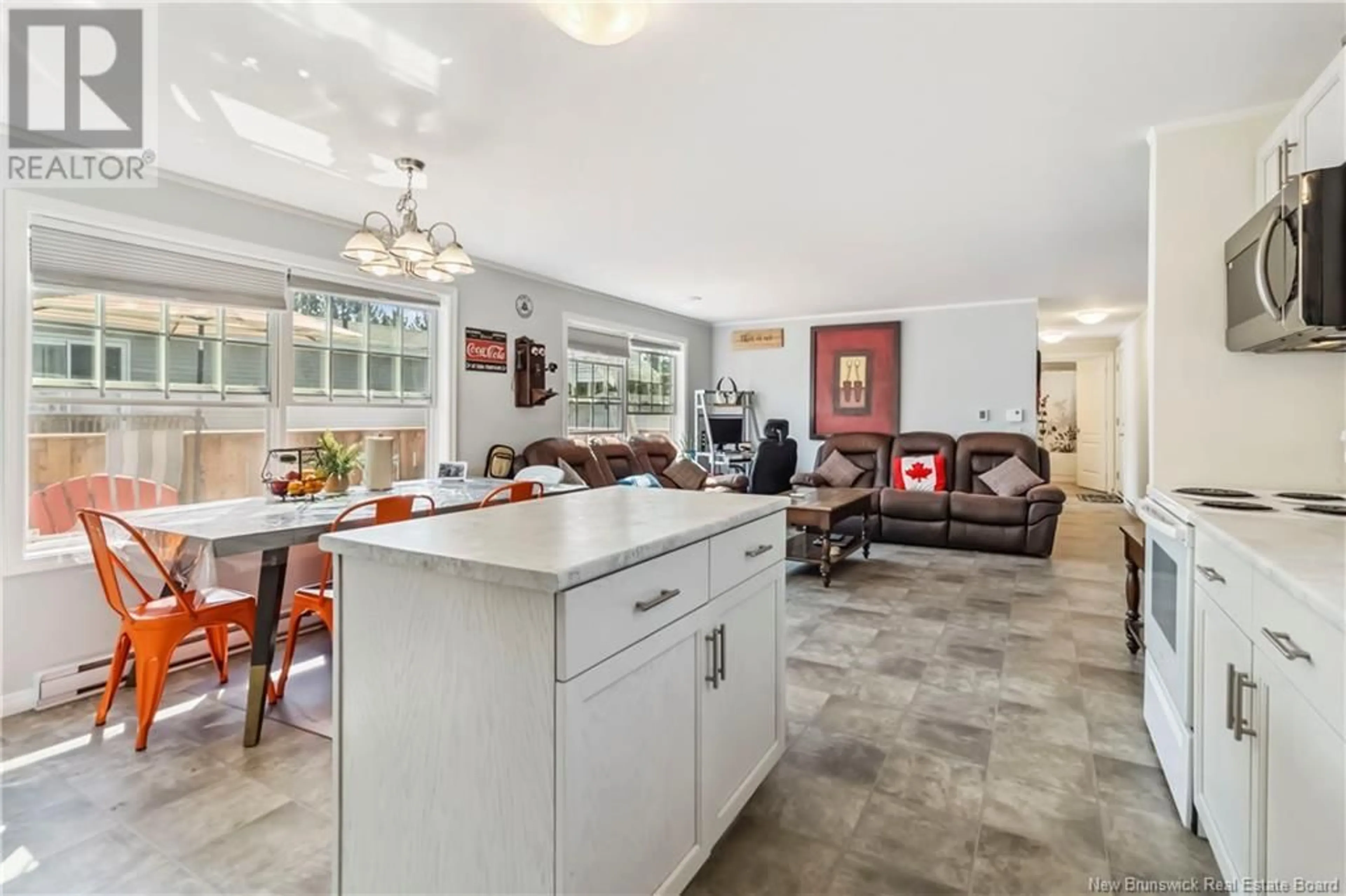 Open concept kitchen, ceramic/tile floor for 65 ULYSSE DRIVE, Dieppe New Brunswick E1A7C2