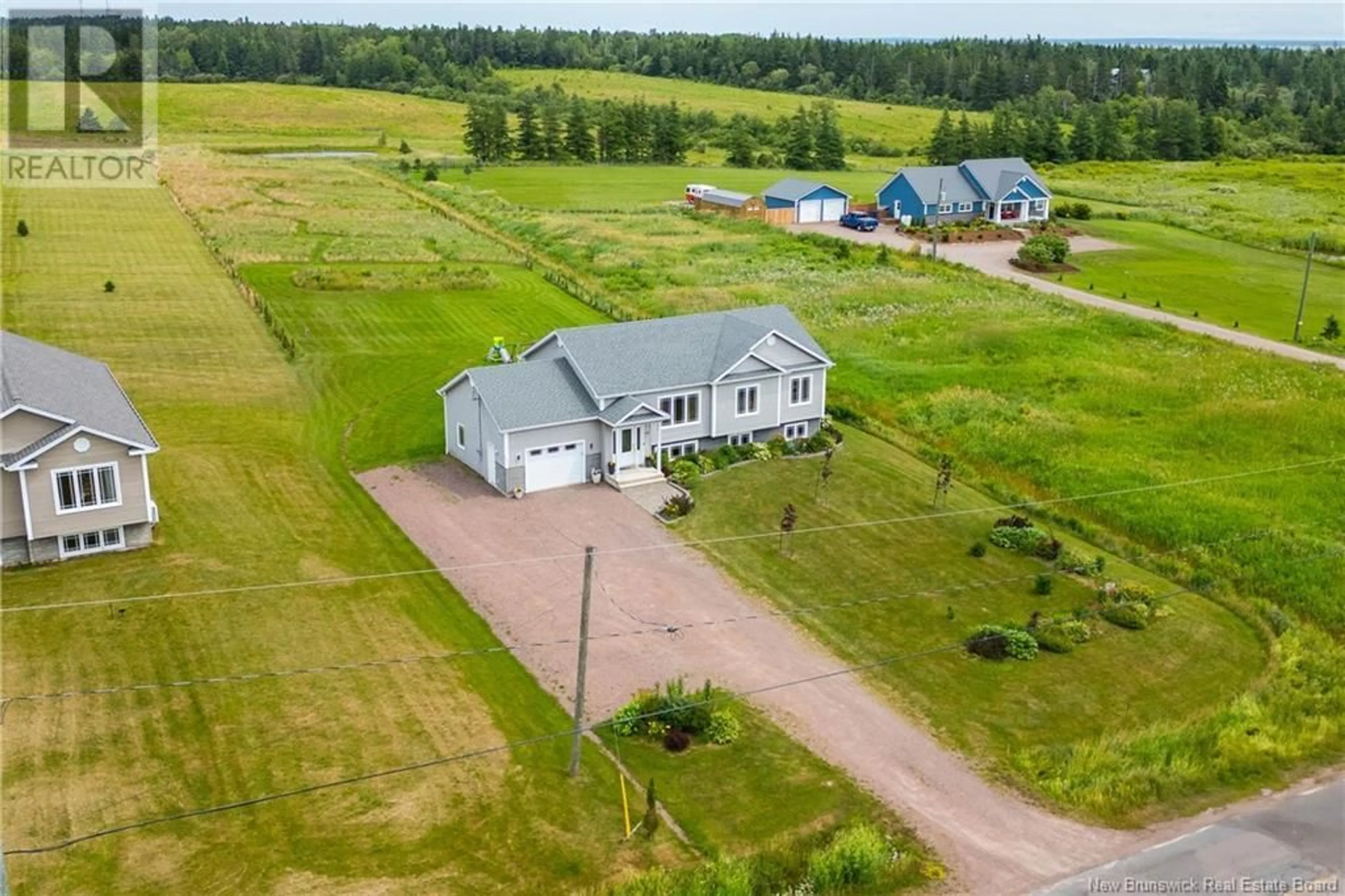 A pic from outside/outdoor area/front of a property/back of a property/a pic from drone, building for 115 FAIRFIELD ROAD, Sackville New Brunswick E4L2X5