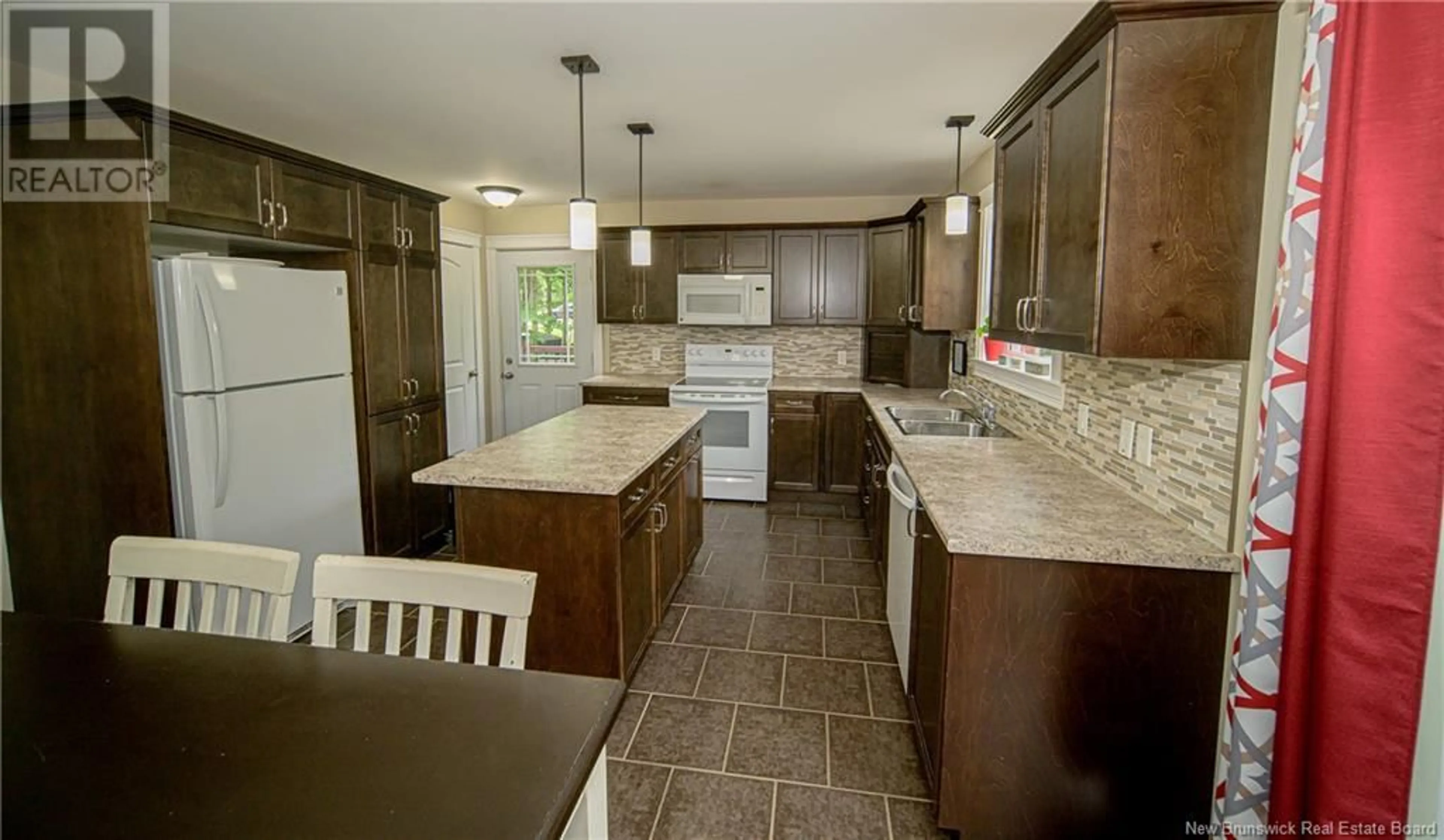 Open concept kitchen, ceramic/tile floor for 21 LYMAN STREET, Burton New Brunswick E2V0H9