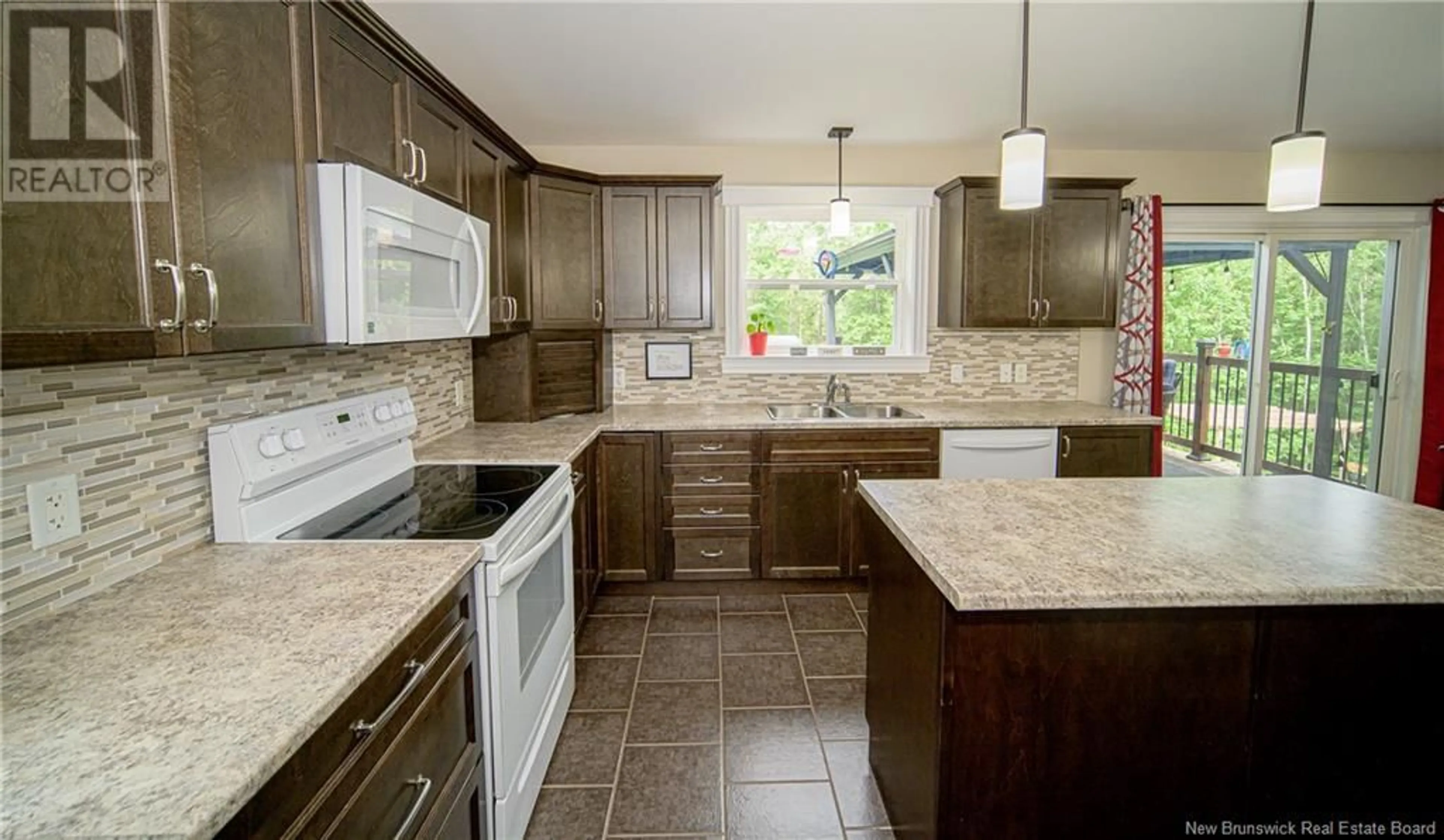 Open concept kitchen, ceramic/tile floor for 21 LYMAN STREET, Burton New Brunswick E2V0H9