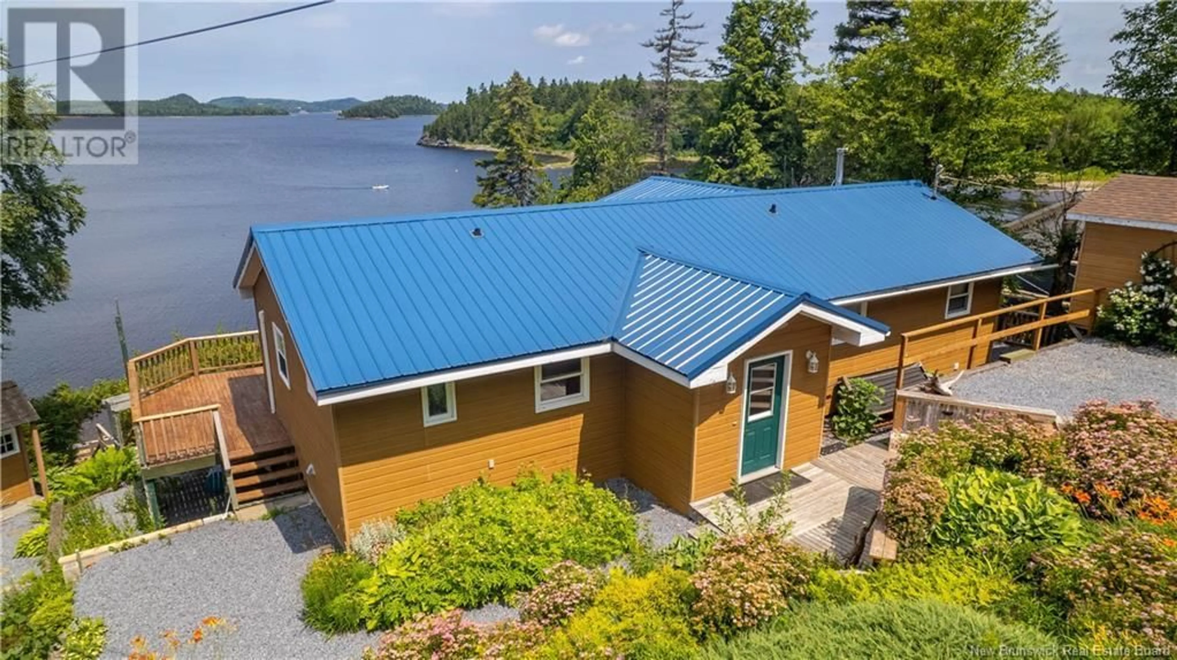 A pic from outside/outdoor area/front of a property/back of a property/a pic from drone, water/lake/river/ocean view for 28 EEL COVE ROAD, Utopia New Brunswick E5C2J4