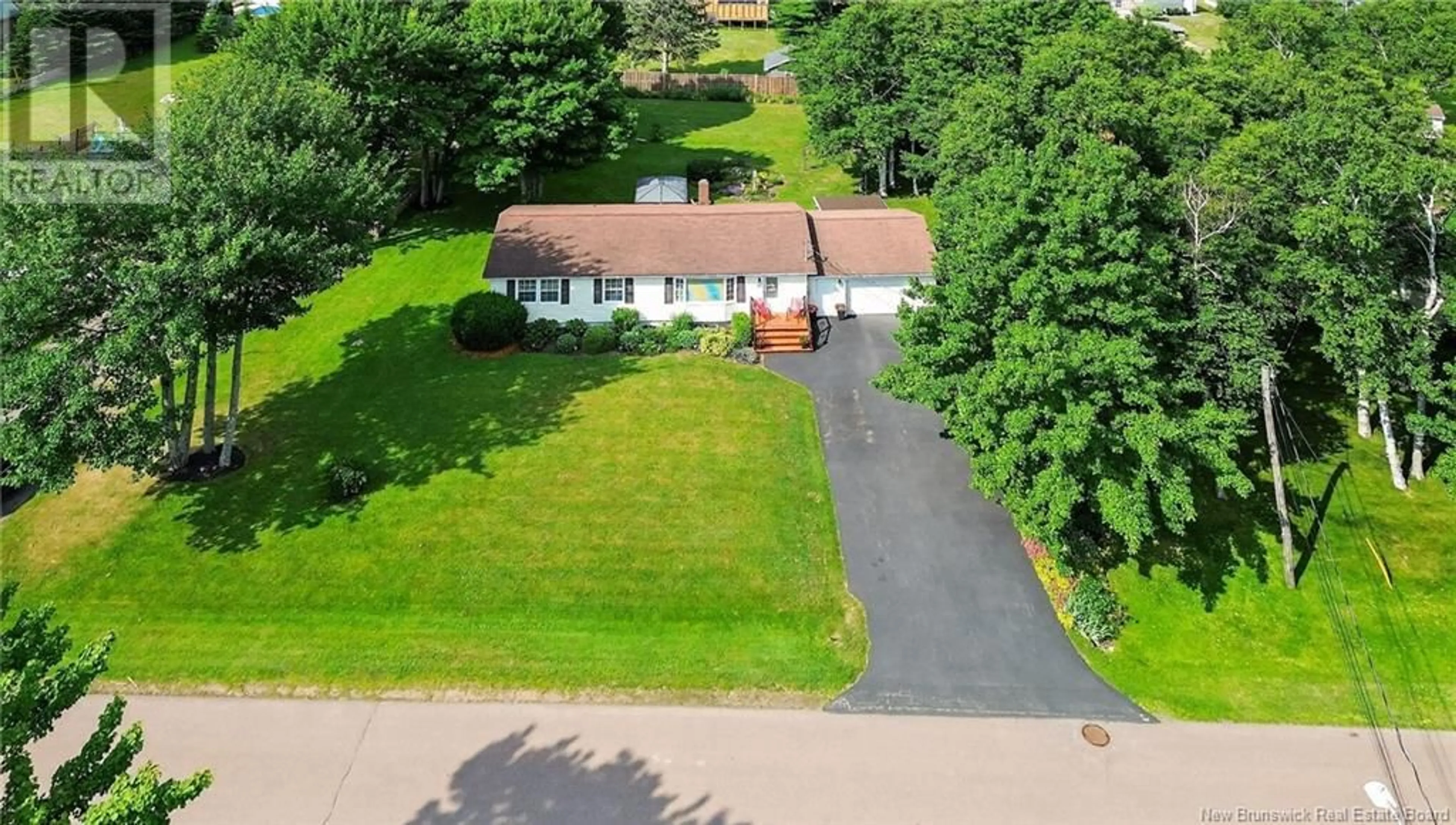 A pic from outside/outdoor area/front of a property/back of a property/a pic from drone, street for 85 MONTCLAIR STREET, Shediac New Brunswick E4P2J2