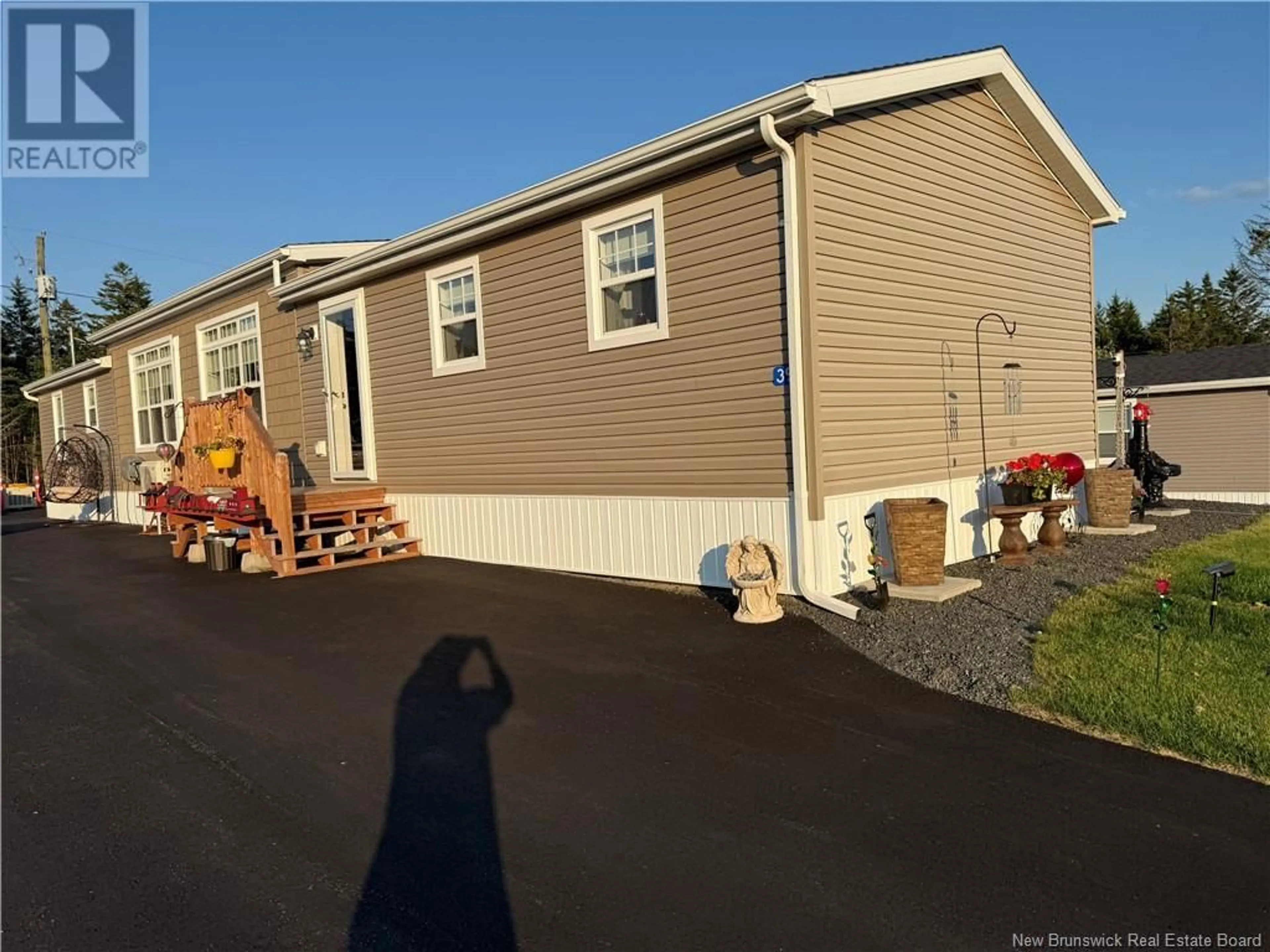Home with vinyl exterior material, street for 39 HARVEST LANE, St George New Brunswick E5C0J3