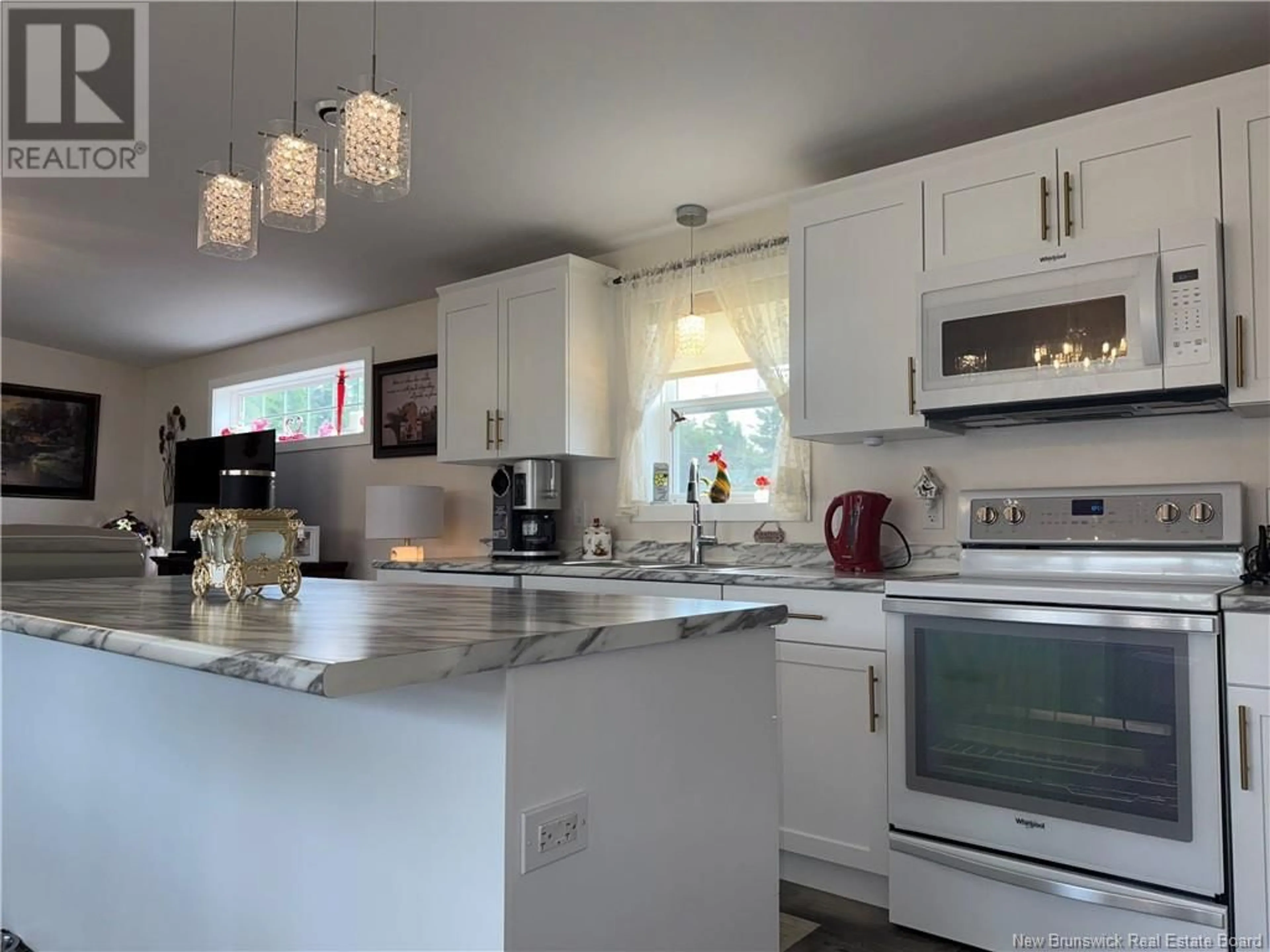Open concept kitchen, ceramic/tile floor for 39 HARVEST LANE, St George New Brunswick E5C0J3