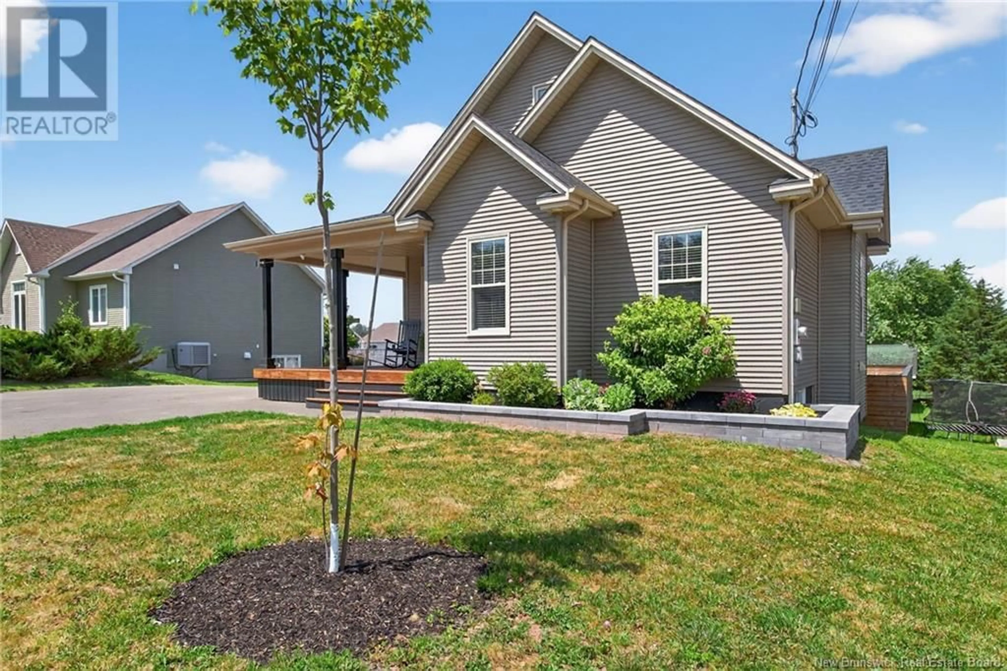 Home with vinyl exterior material, street for 57 FIDELE COURT, Dieppe New Brunswick E1A0C9